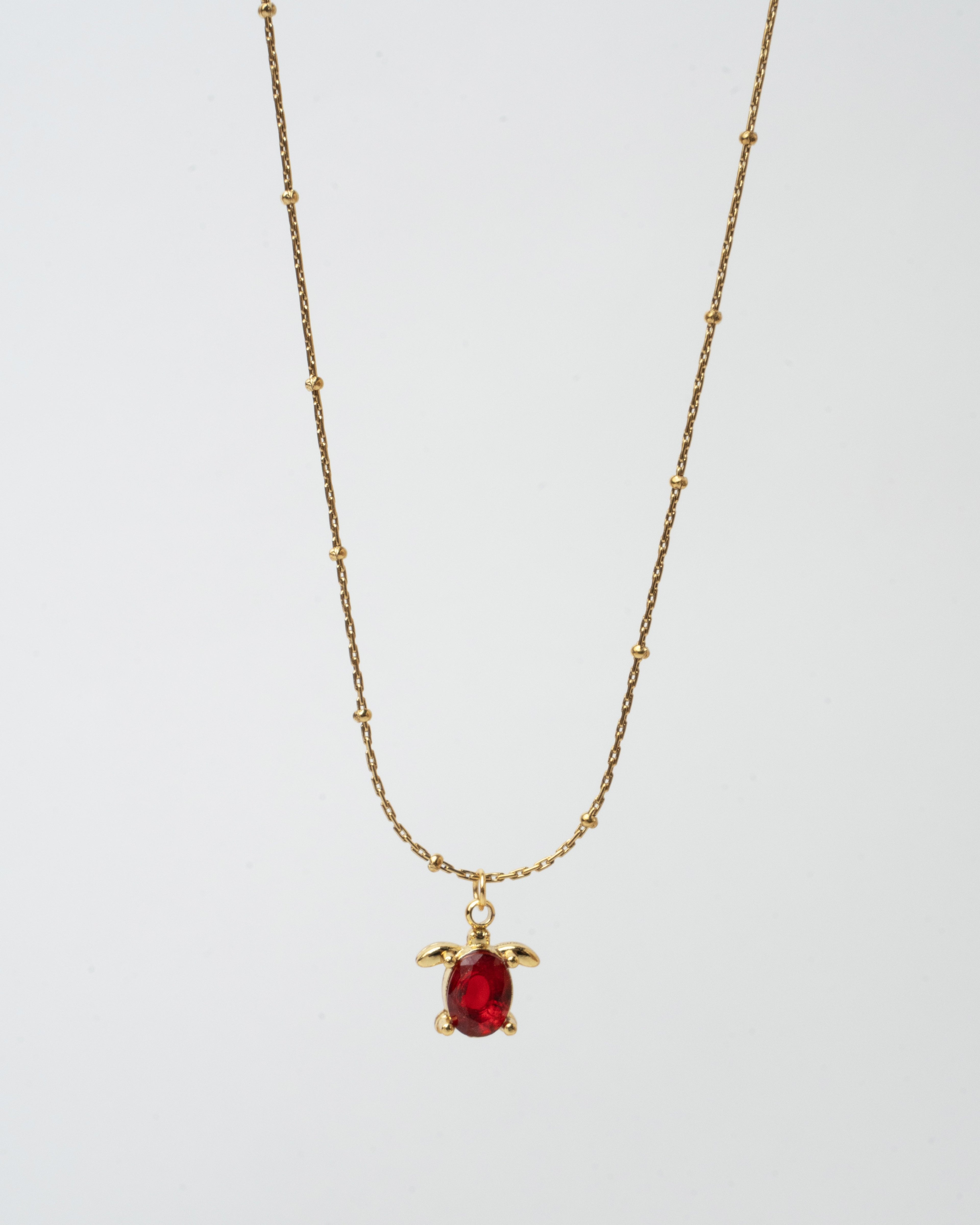 Elegant Gold Chain Necklace with Ruby Turtle Pendant