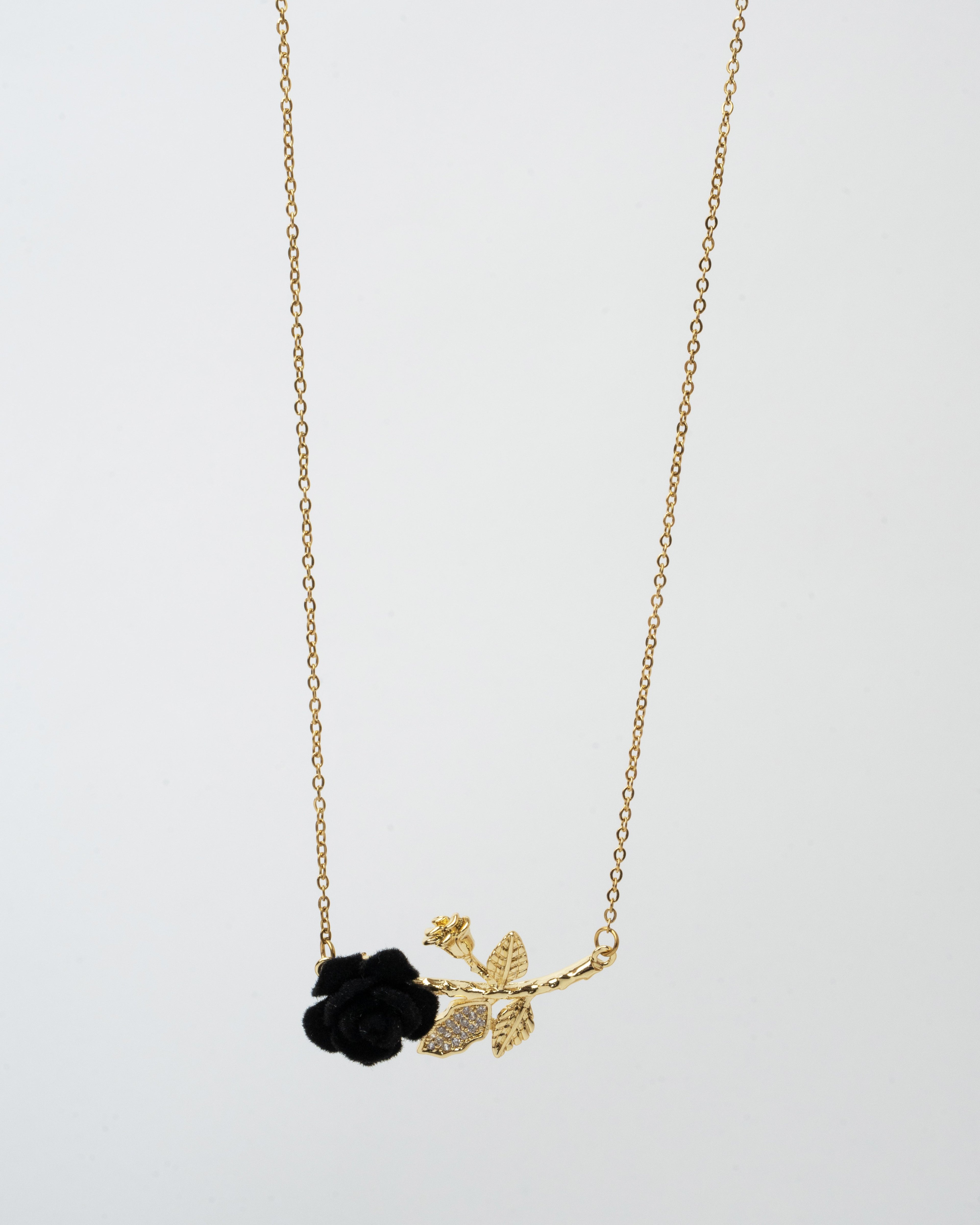 Elegant Gold Rose Pendant Necklace with Black Floral Accent