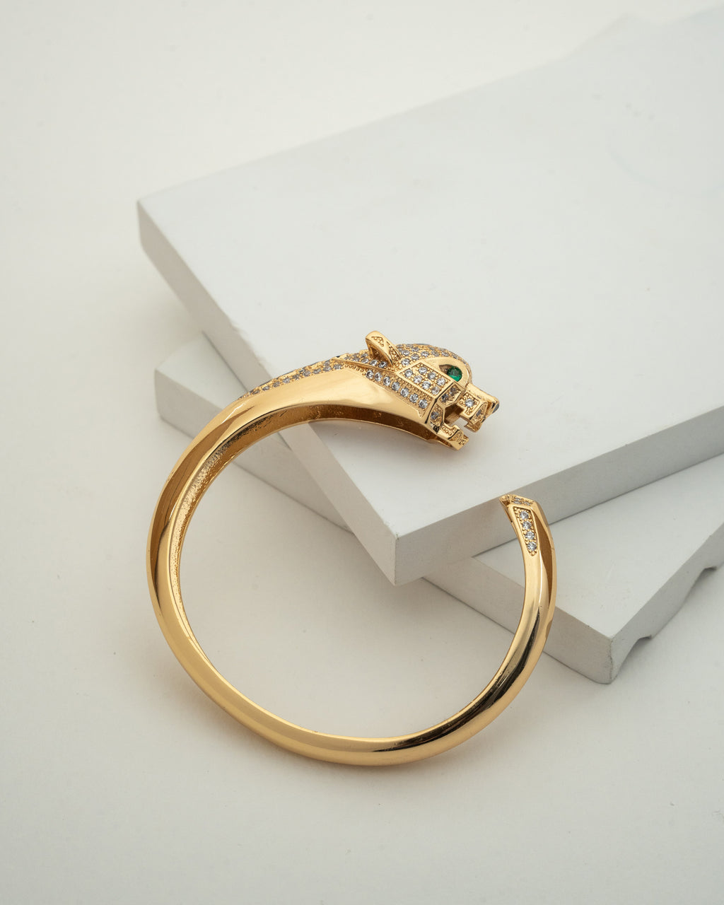 Elegant Gold-Plated Bangle with Intricate Stone Detailing