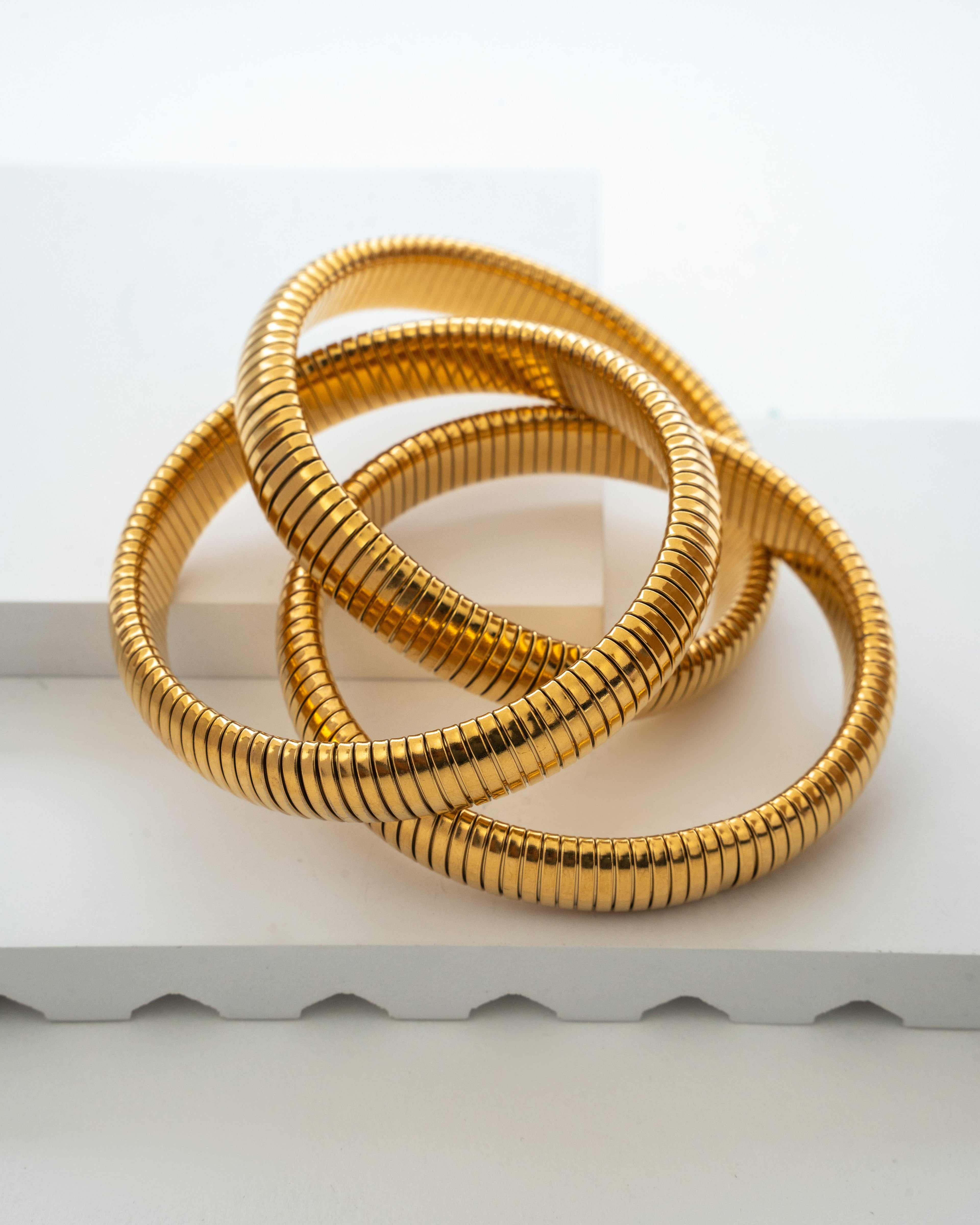 Elegant Gold-Toned Flexible Bangles