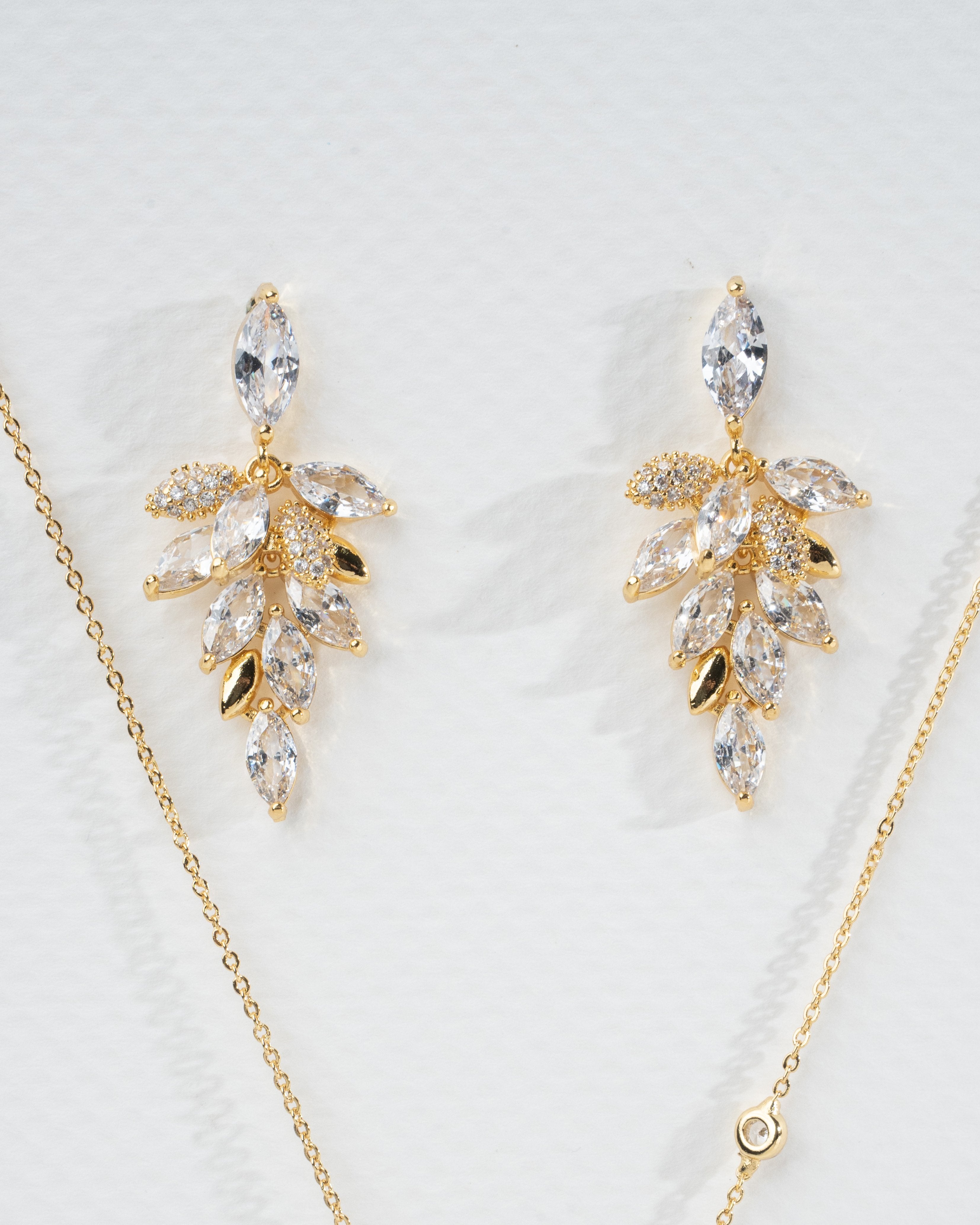 Elegant Gold Leaf Necklace and Earring Set with Crystal Accents