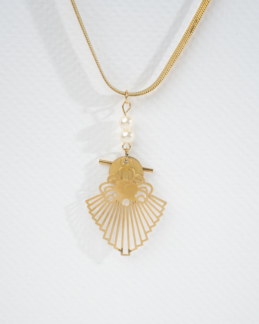 Elegant Gold Filigree Pendant and Earring Set with Pearl Accents