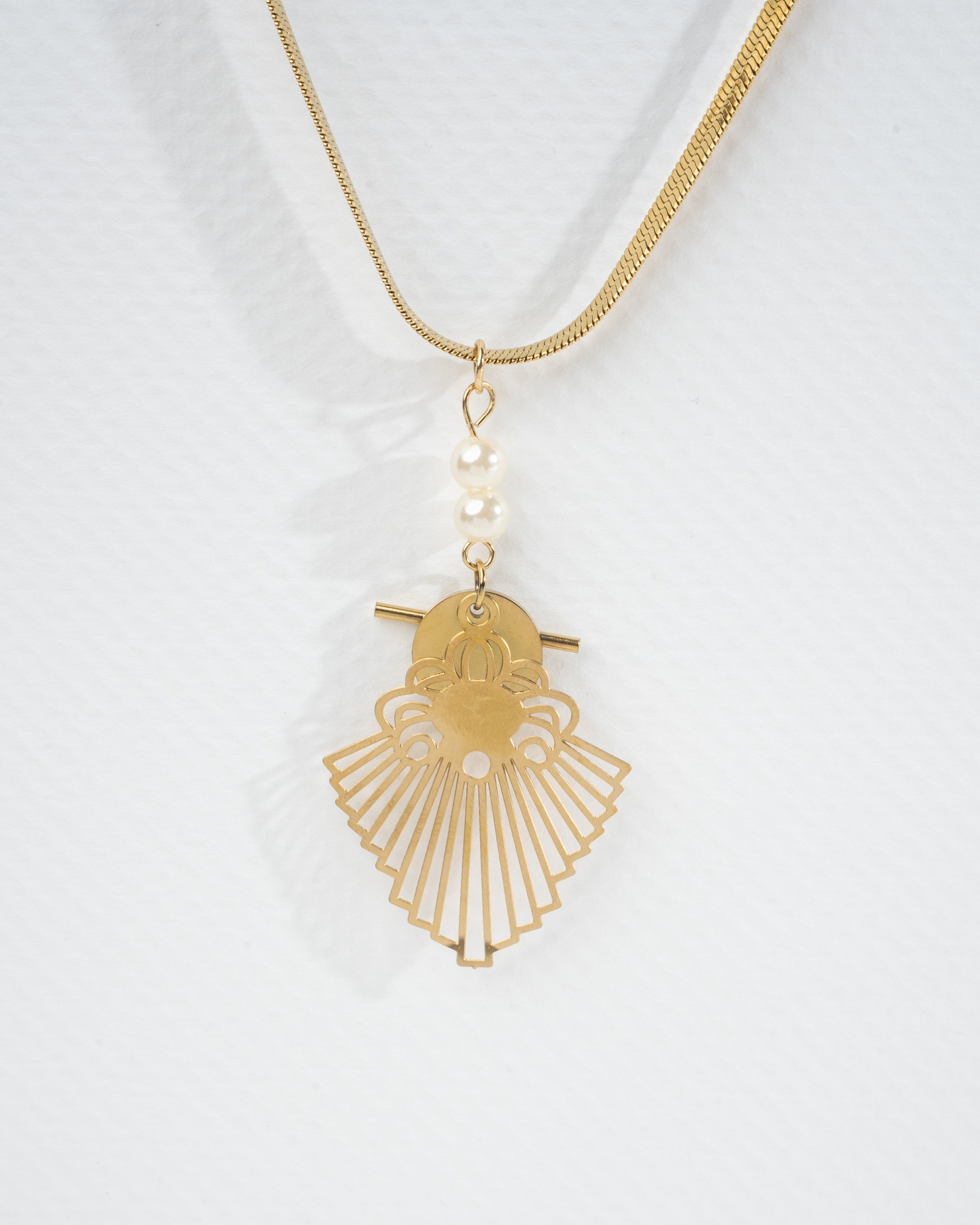 Elegant Gold Filigree Pendant and Earring Set with Pearl Accents