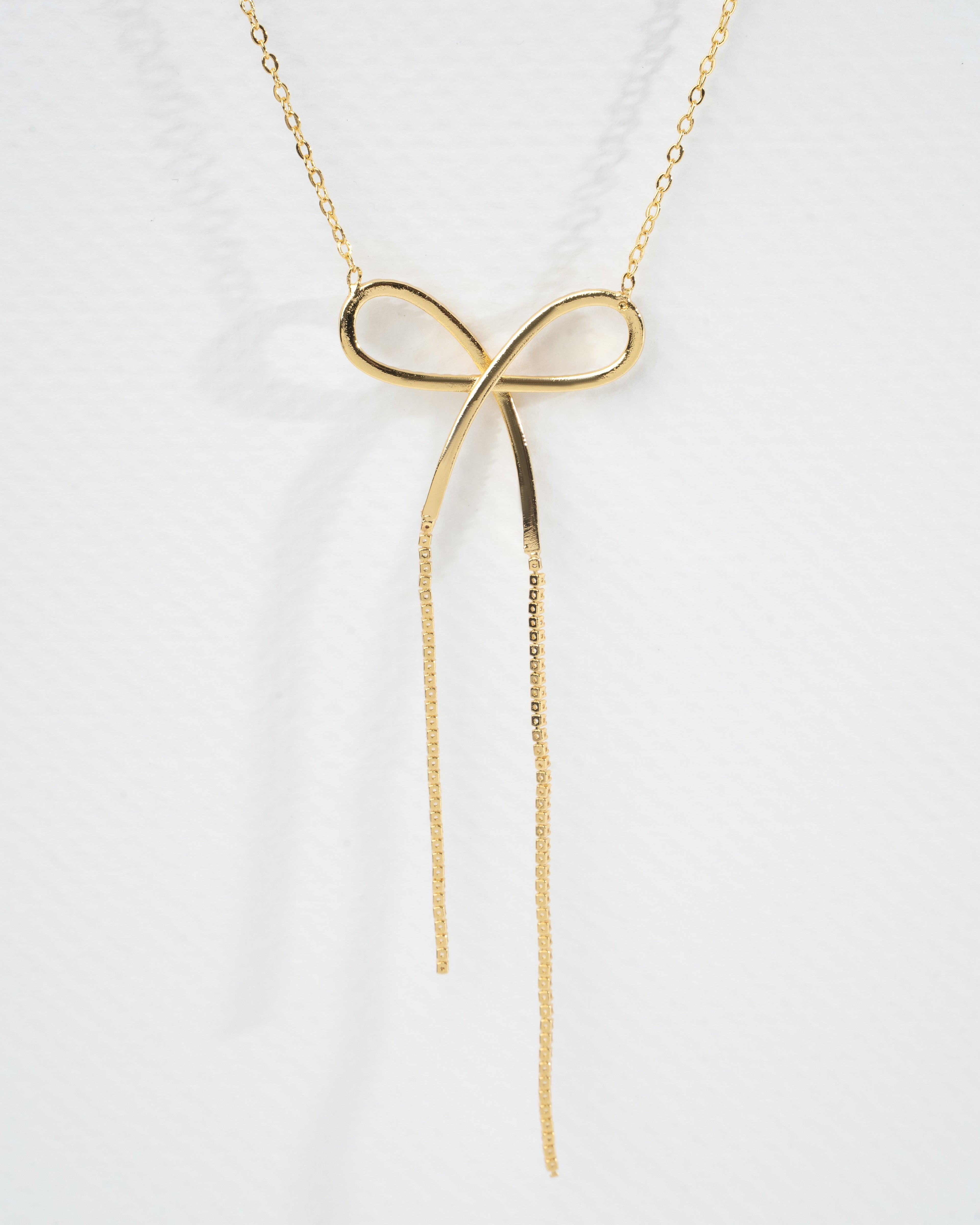 Elegant Gold Bow Jewelry Set - Necklace and Earrings