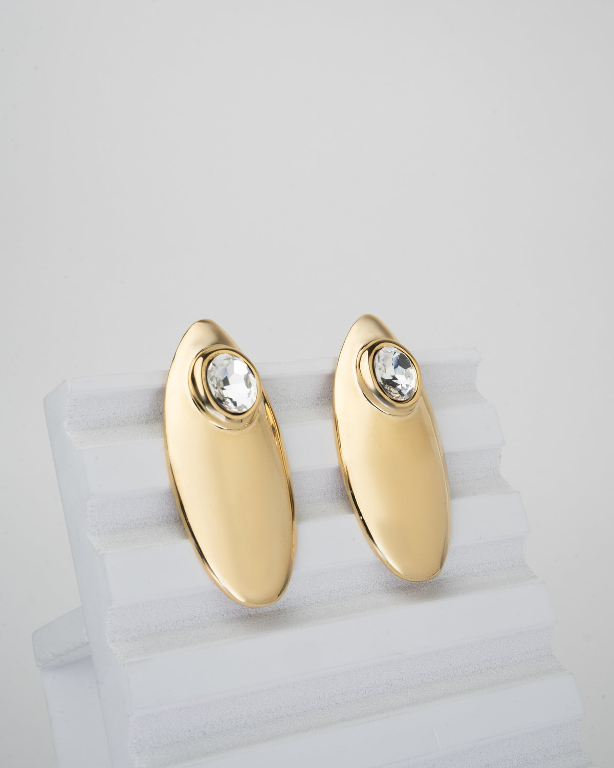 Elegant Gold-Plated Oval Stud Earrings with Crystal Accents