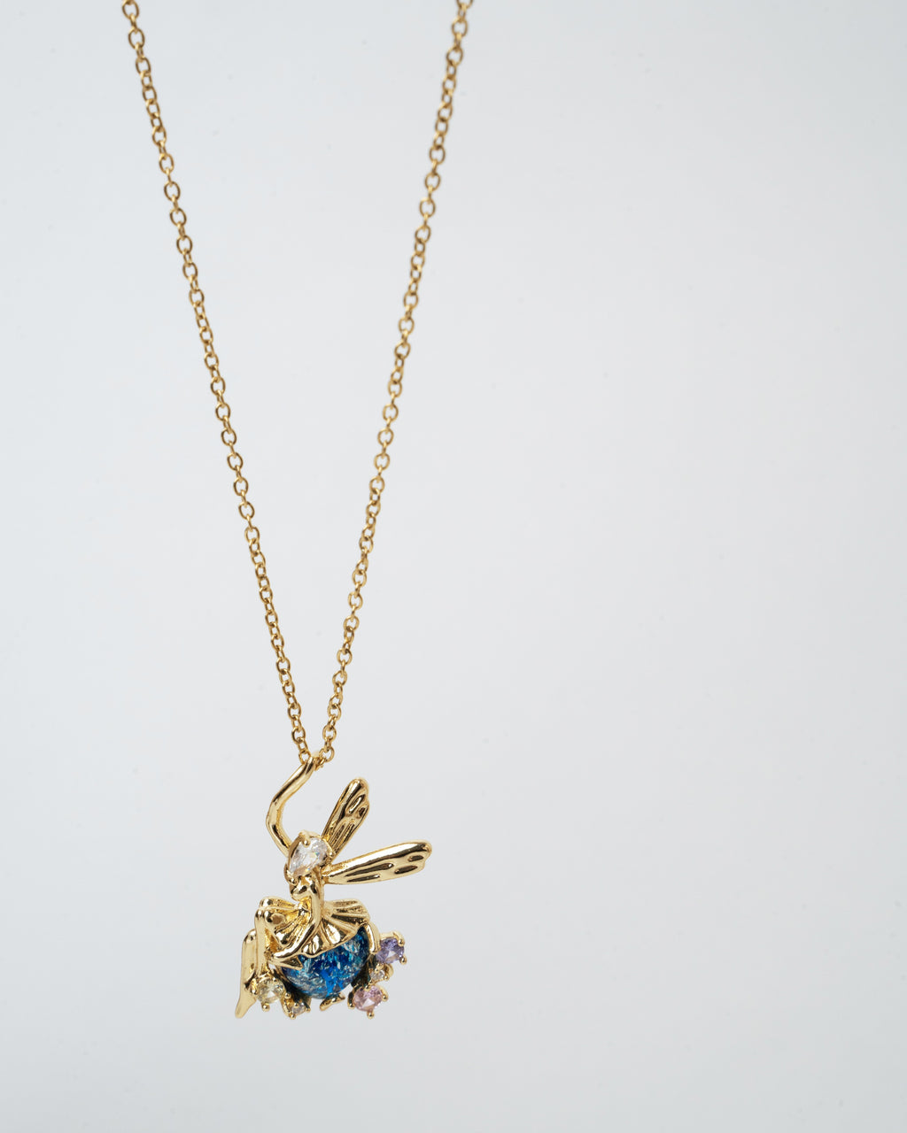 Enchanted Fairy Gold Pendant Necklace with Blue Gemstone