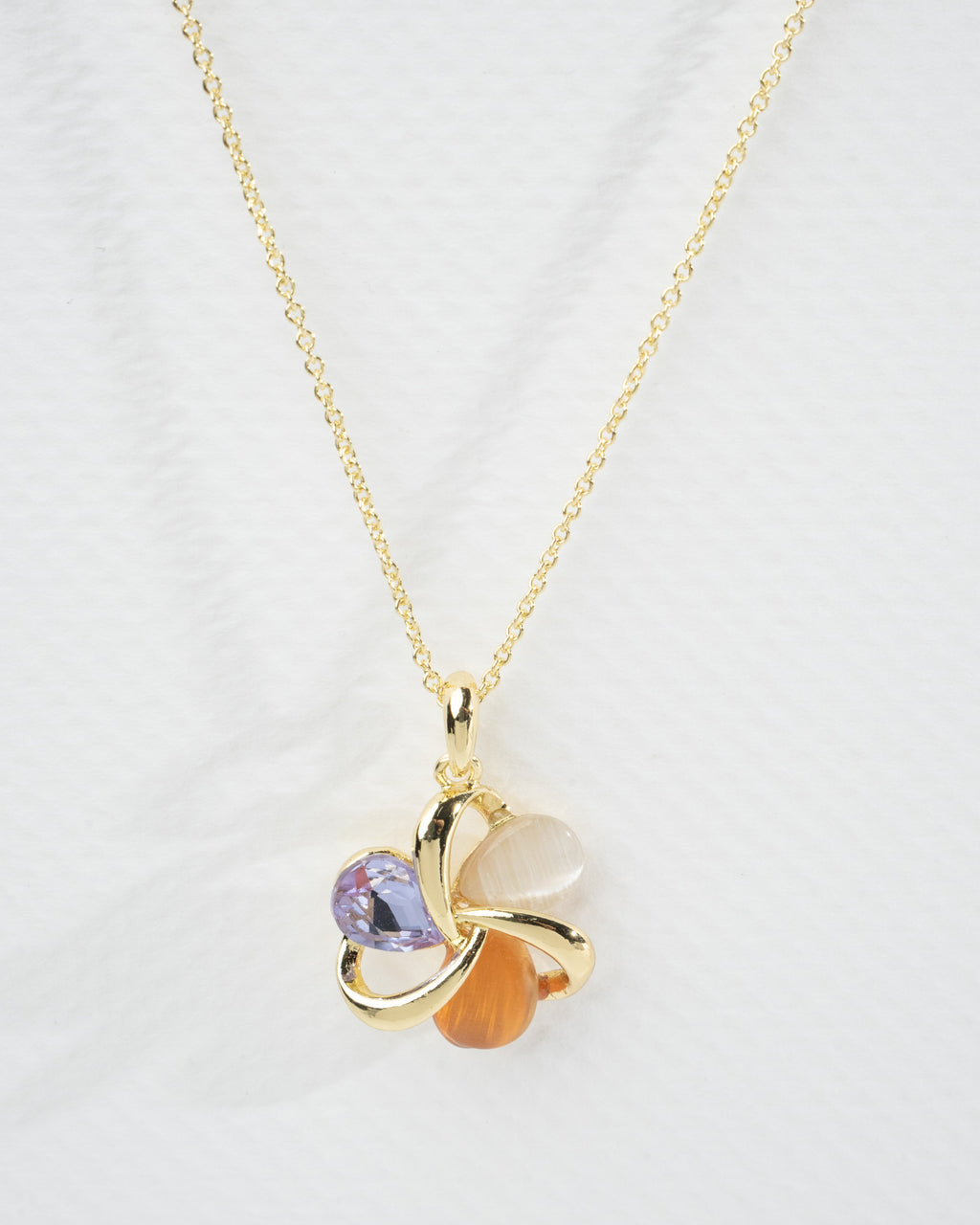 Elegant Multi-Stone Gold Twist Earrings