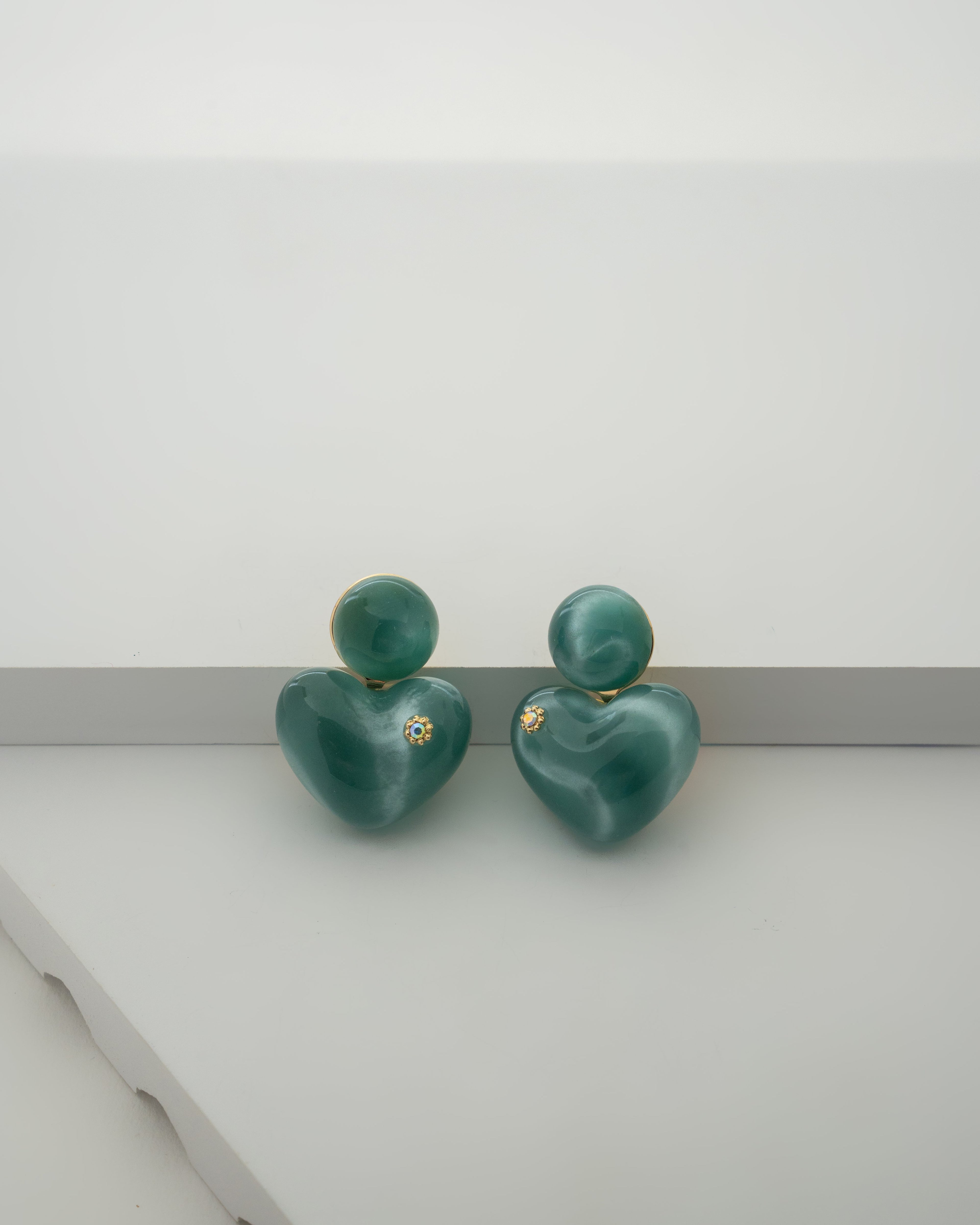 Elegant Teal Heart Shaped Stud Earrings with Gold Accents