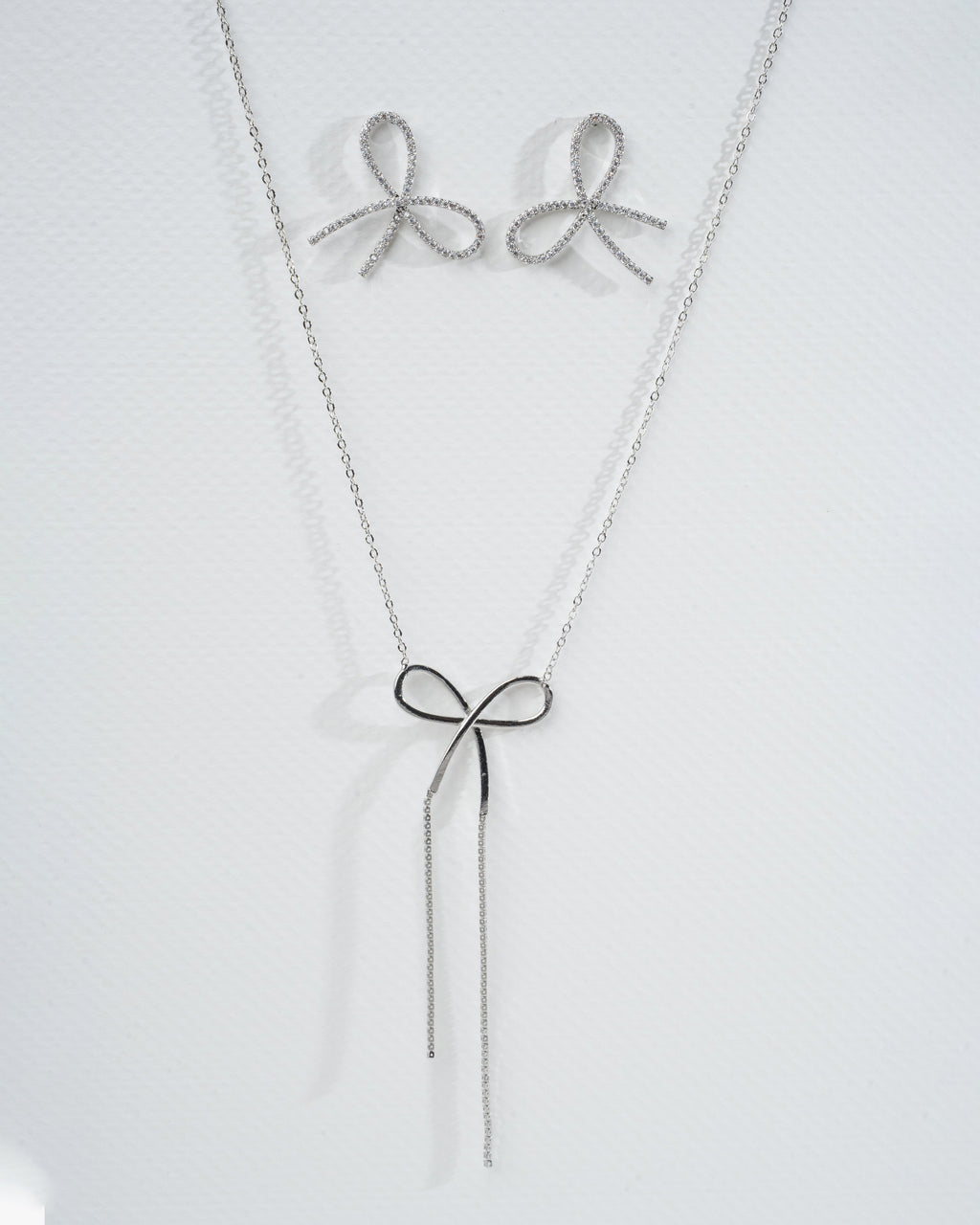 Elegant Silver Bow Necklace and Earring Set
