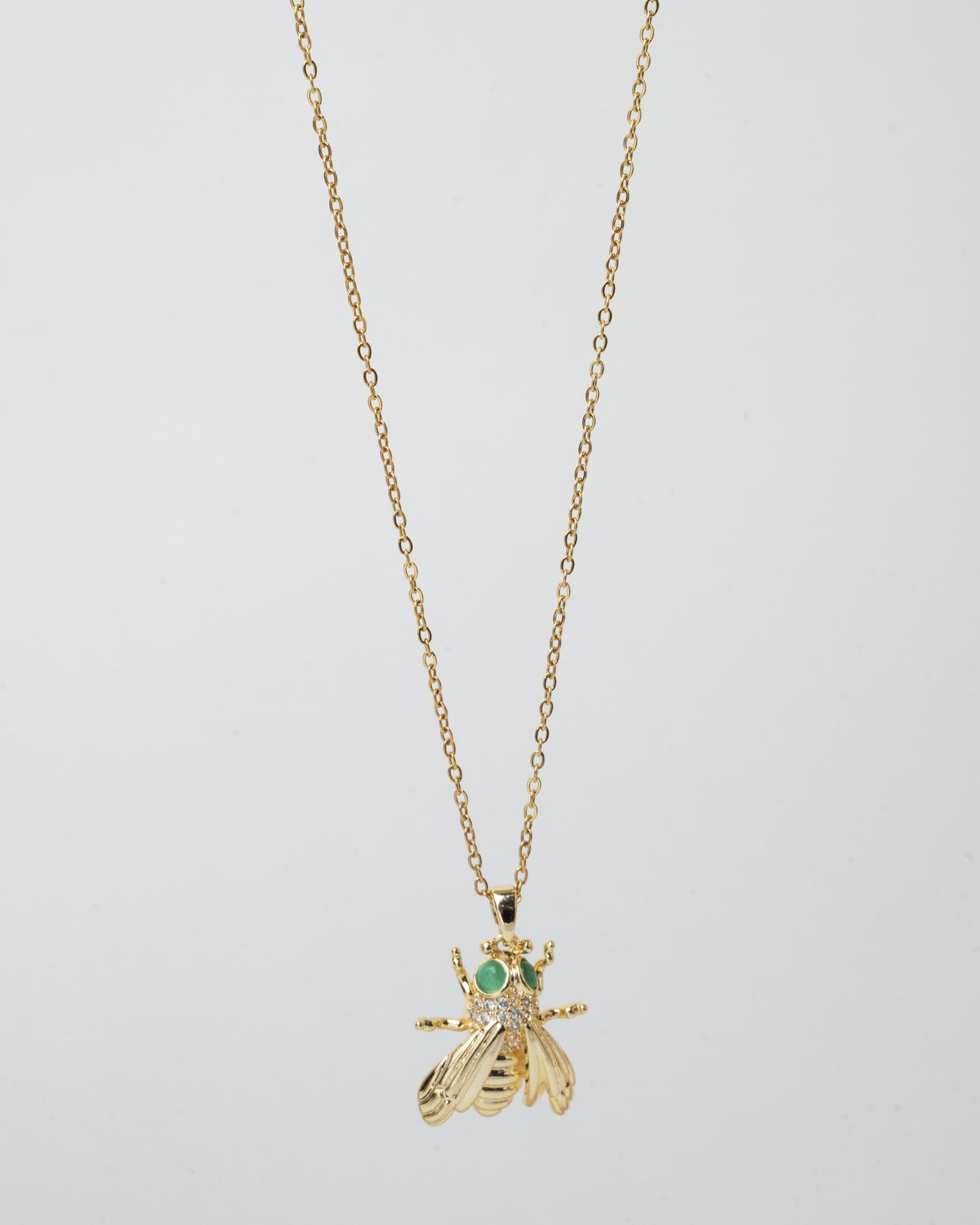 Elegant Gold-Tone Bee Pendant Necklace with Emerald Accents