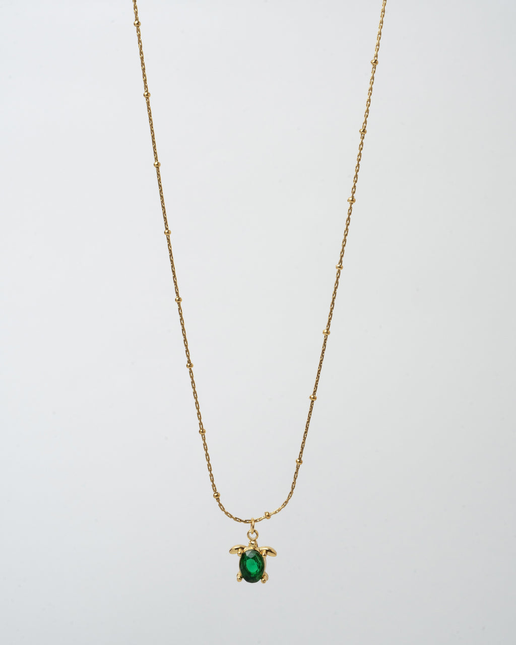 Elegant Gold Turtle Pendant Necklace with Emerald Green Gem