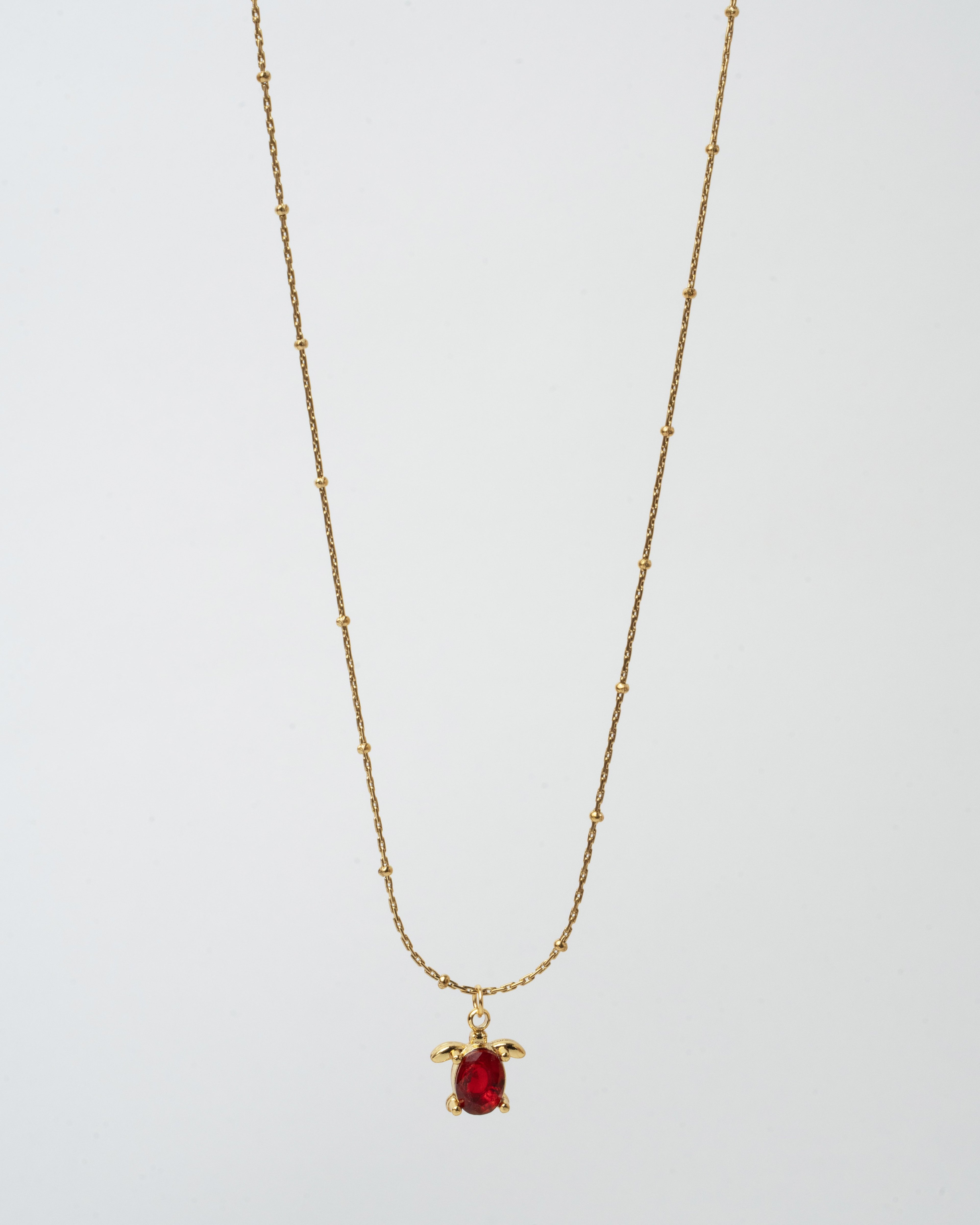 Elegant Gold Chain Necklace with Ruby Turtle Pendant