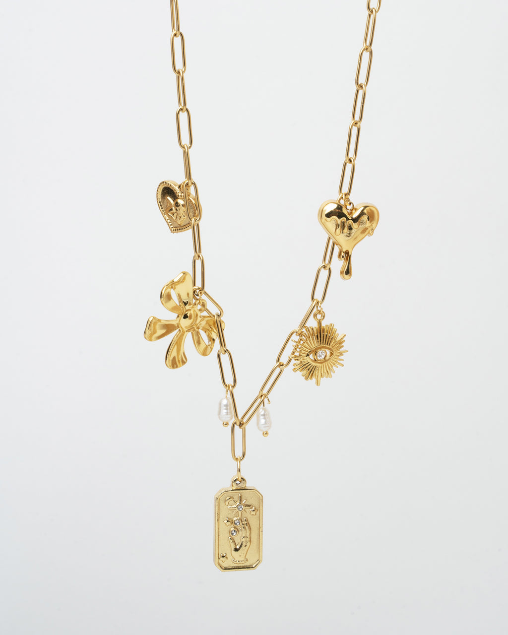 gold charm necklace featuring beautifully crafted pendants
