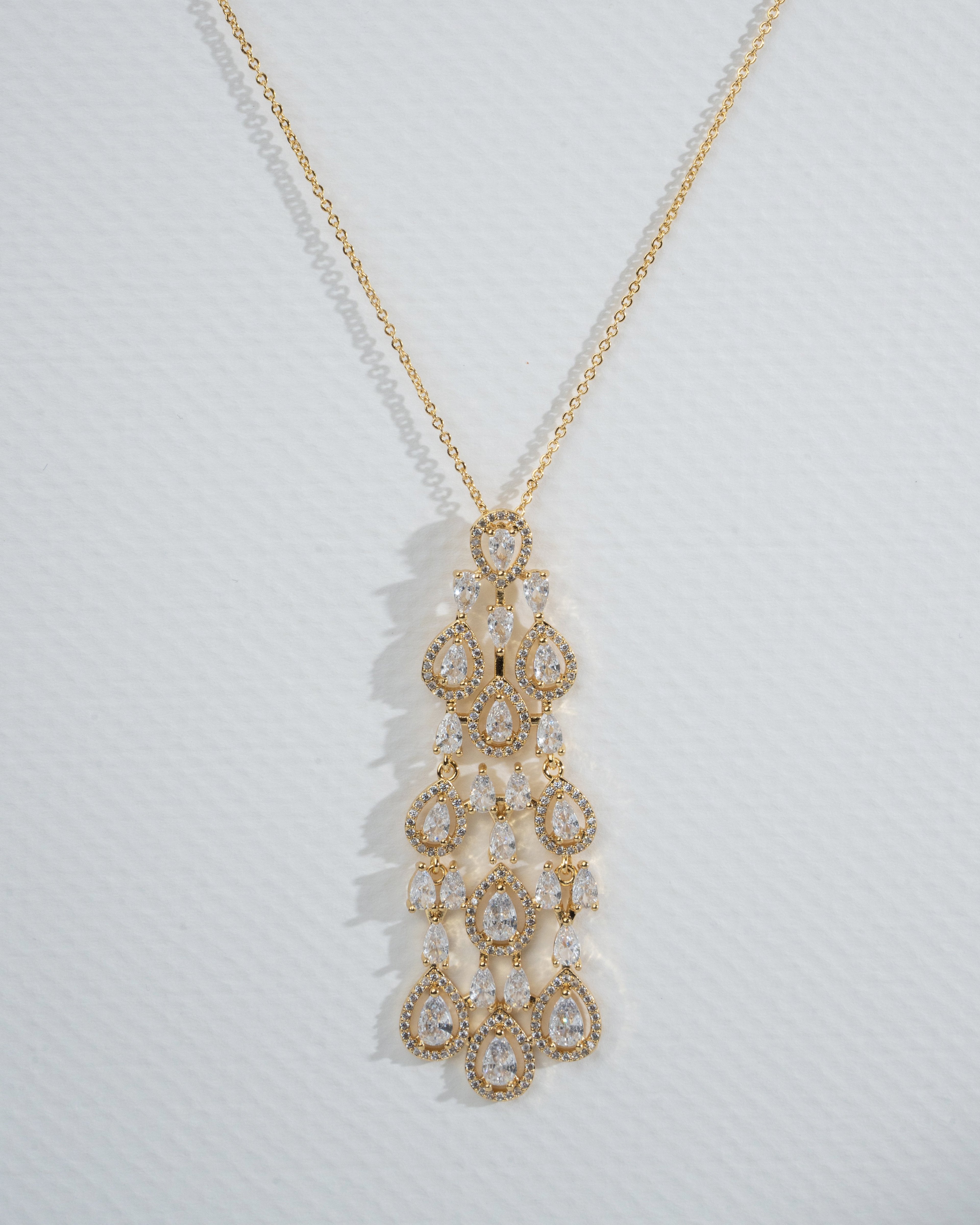 Elegant Gold Chandelier Jewelry Set with Pear-Cut Crystals