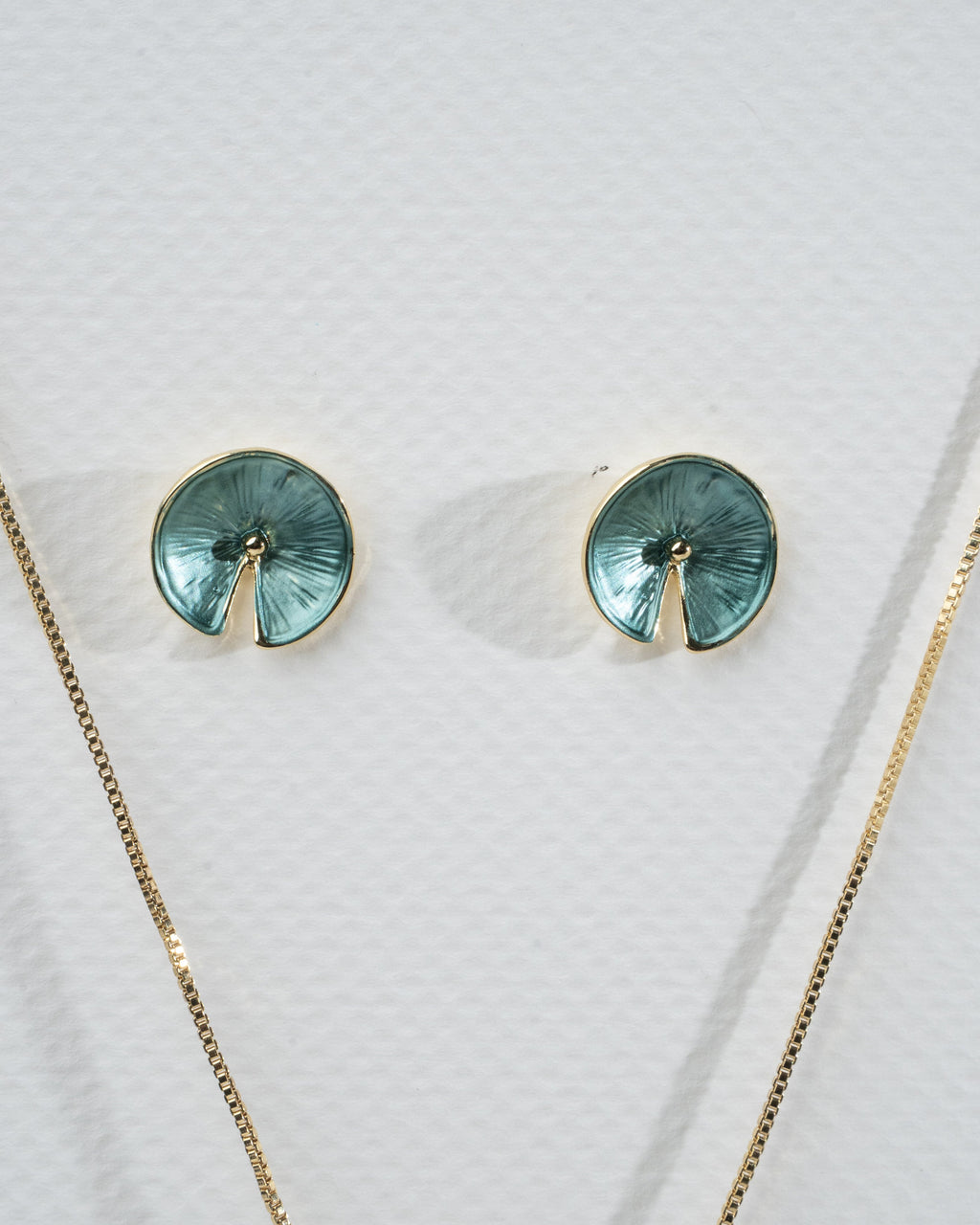 Elegant Gold and Teal Spiral Jewelry Set