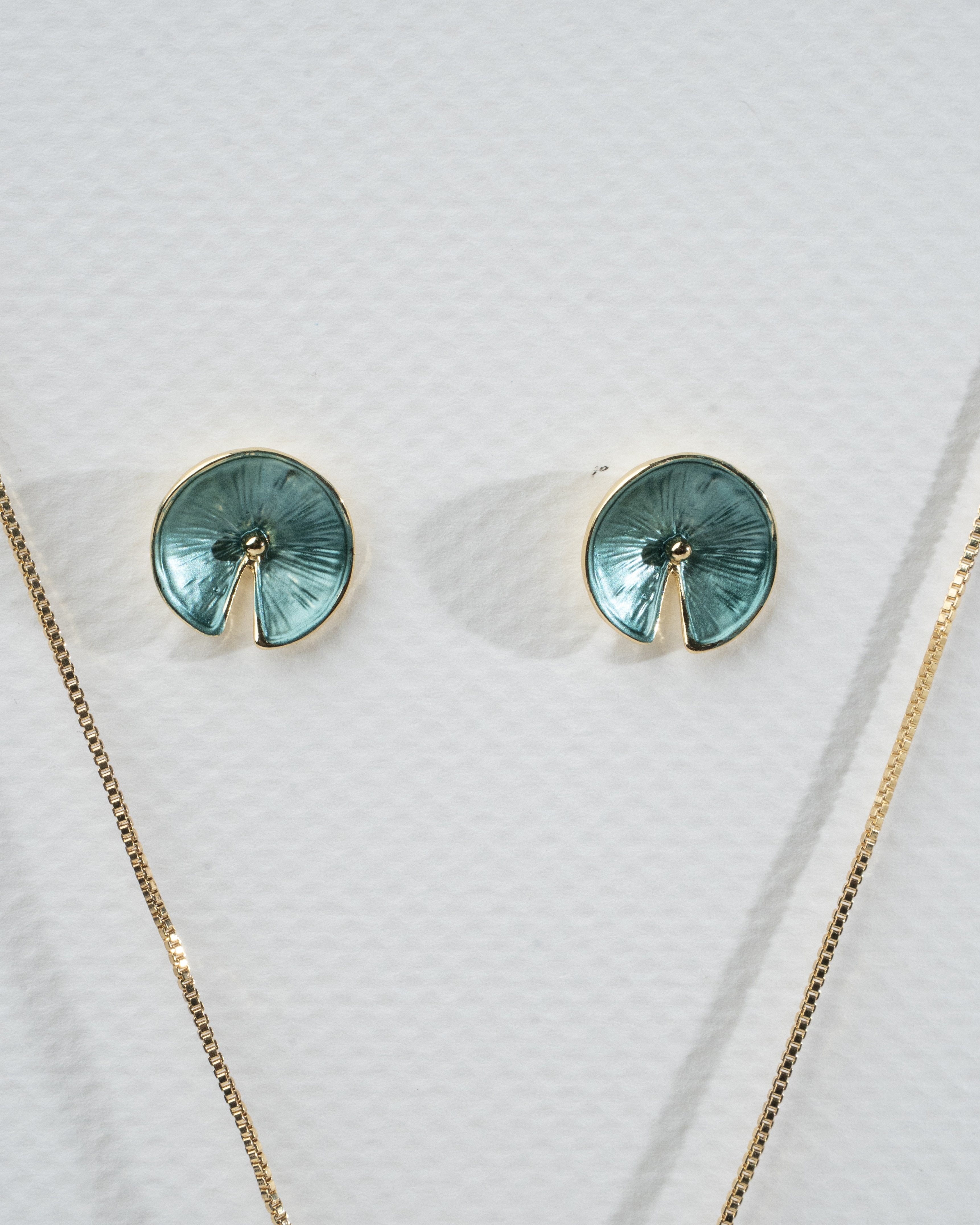 Elegant Gold and Teal Spiral Jewelry Set