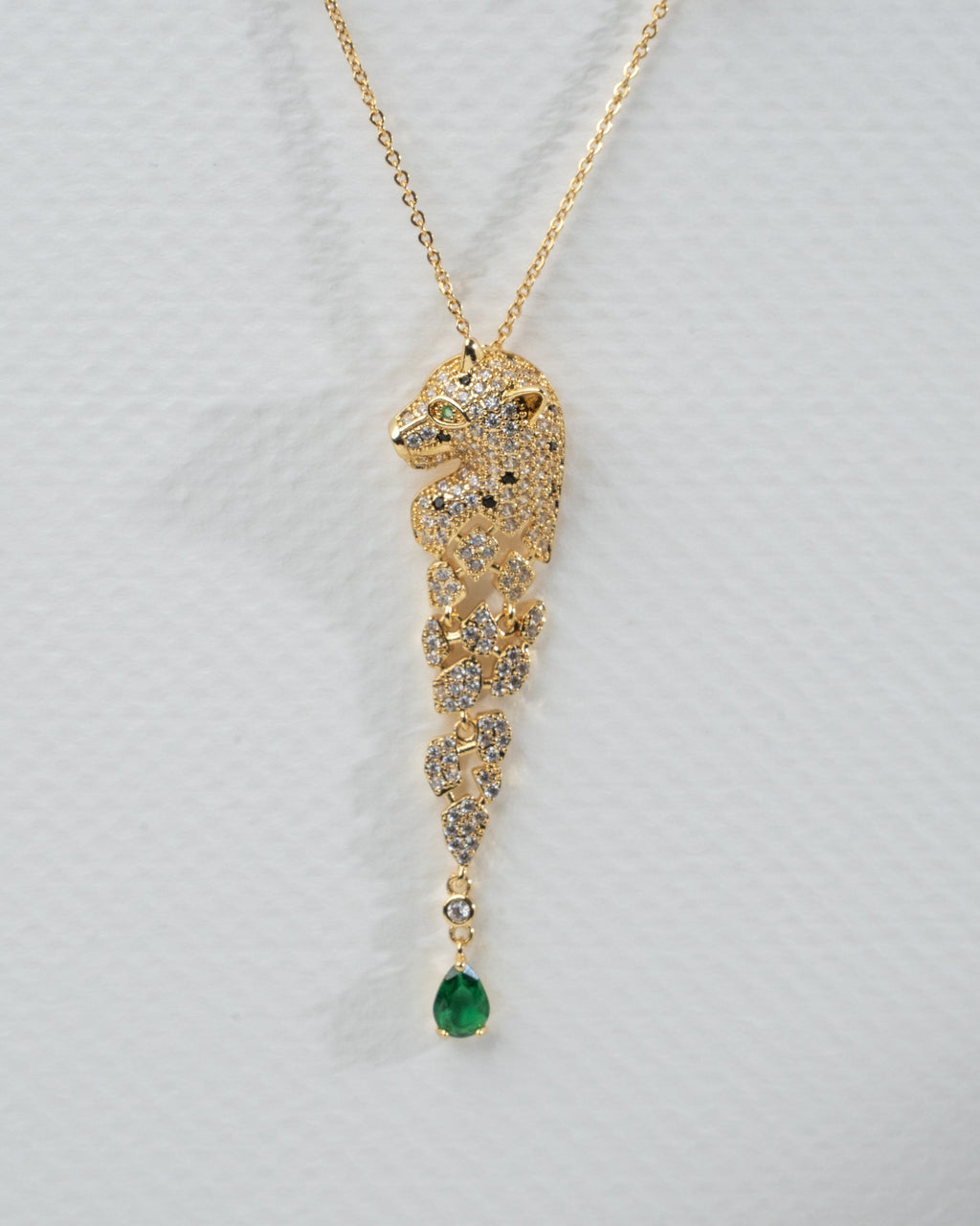 Elegant Panther Motif Gold Jewelry Set with Emerald Accents