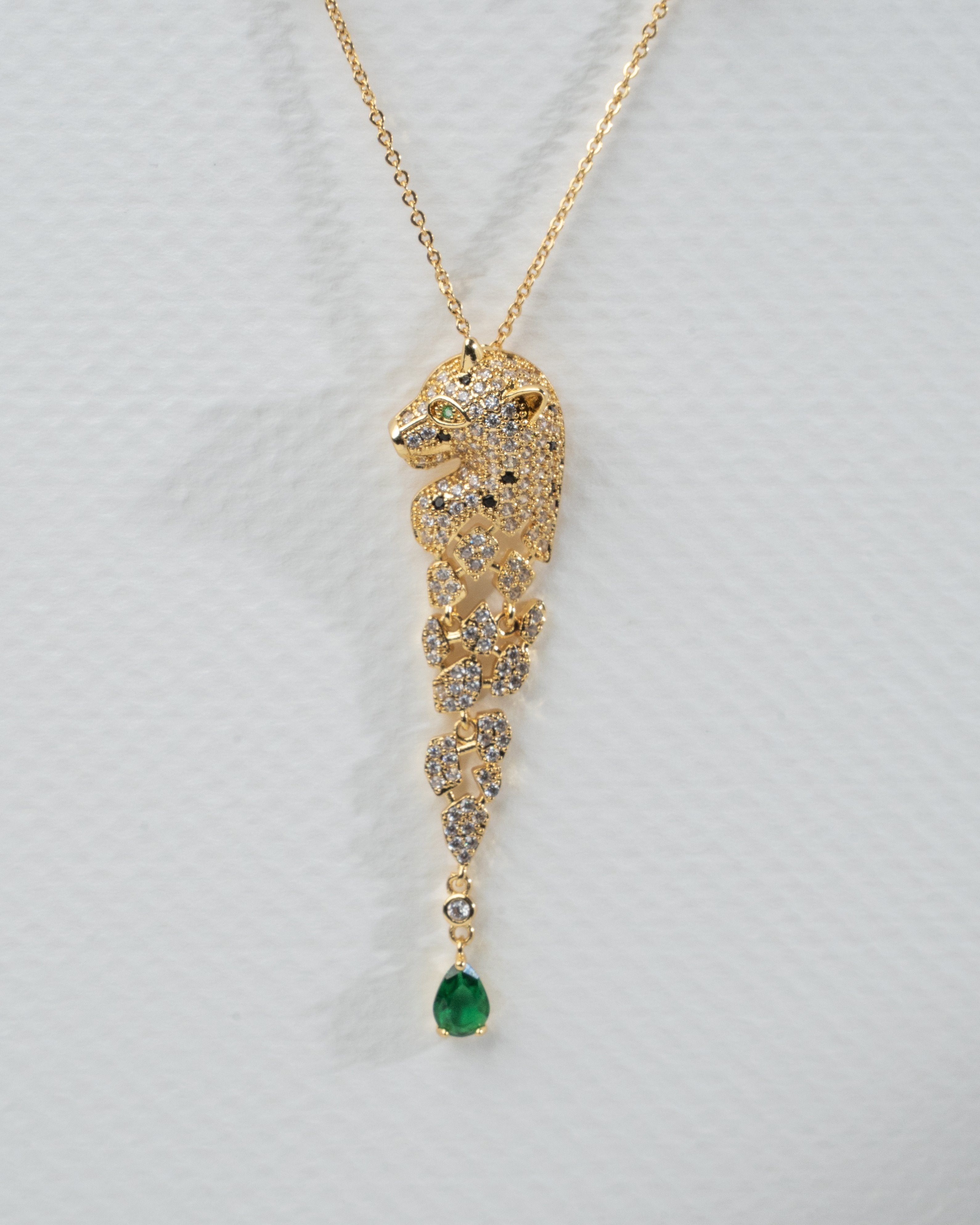 Elegant Panther Motif Gold Jewelry Set with Emerald Accents