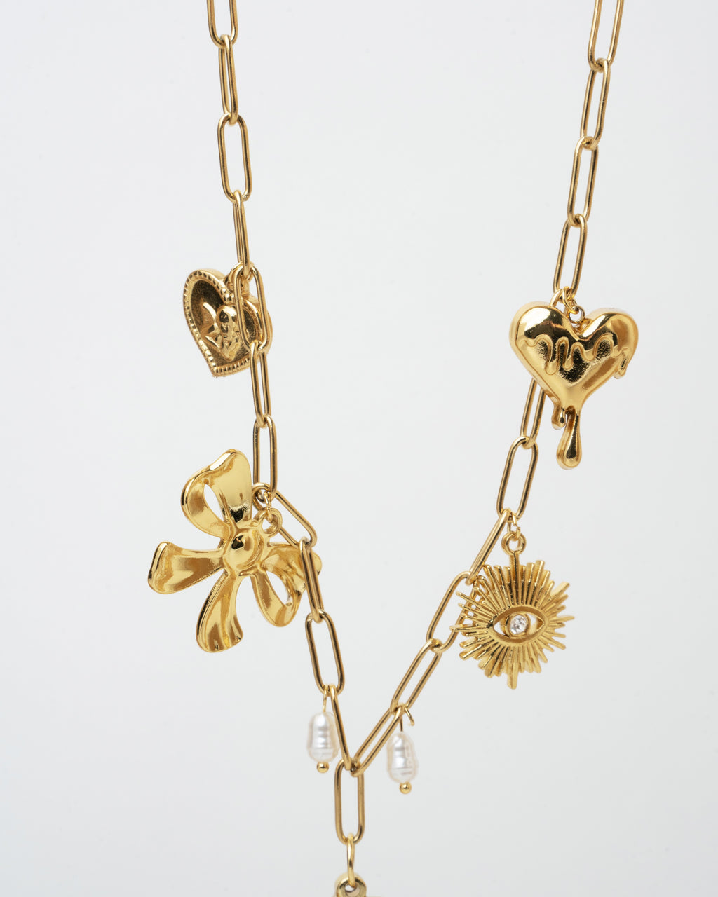 gold charm necklace featuring beautifully crafted pendants