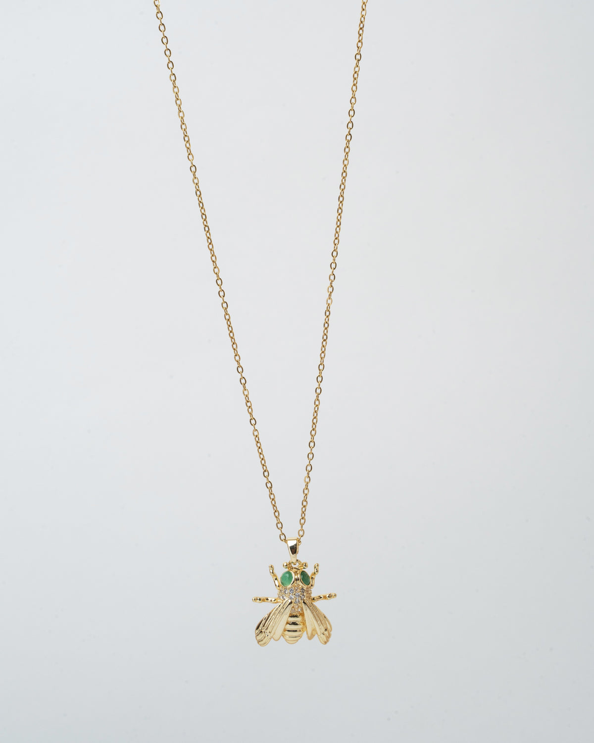 Elegant Gold-Tone Bee Pendant Necklace with Emerald Accents