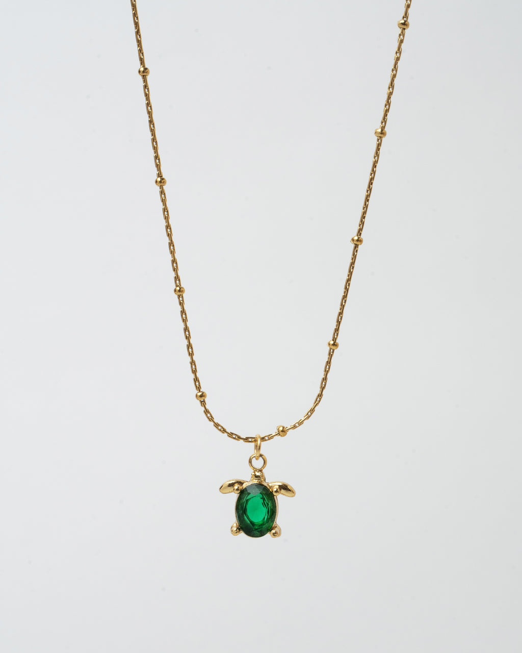 Elegant Gold Turtle Pendant Necklace with Emerald Green Gem