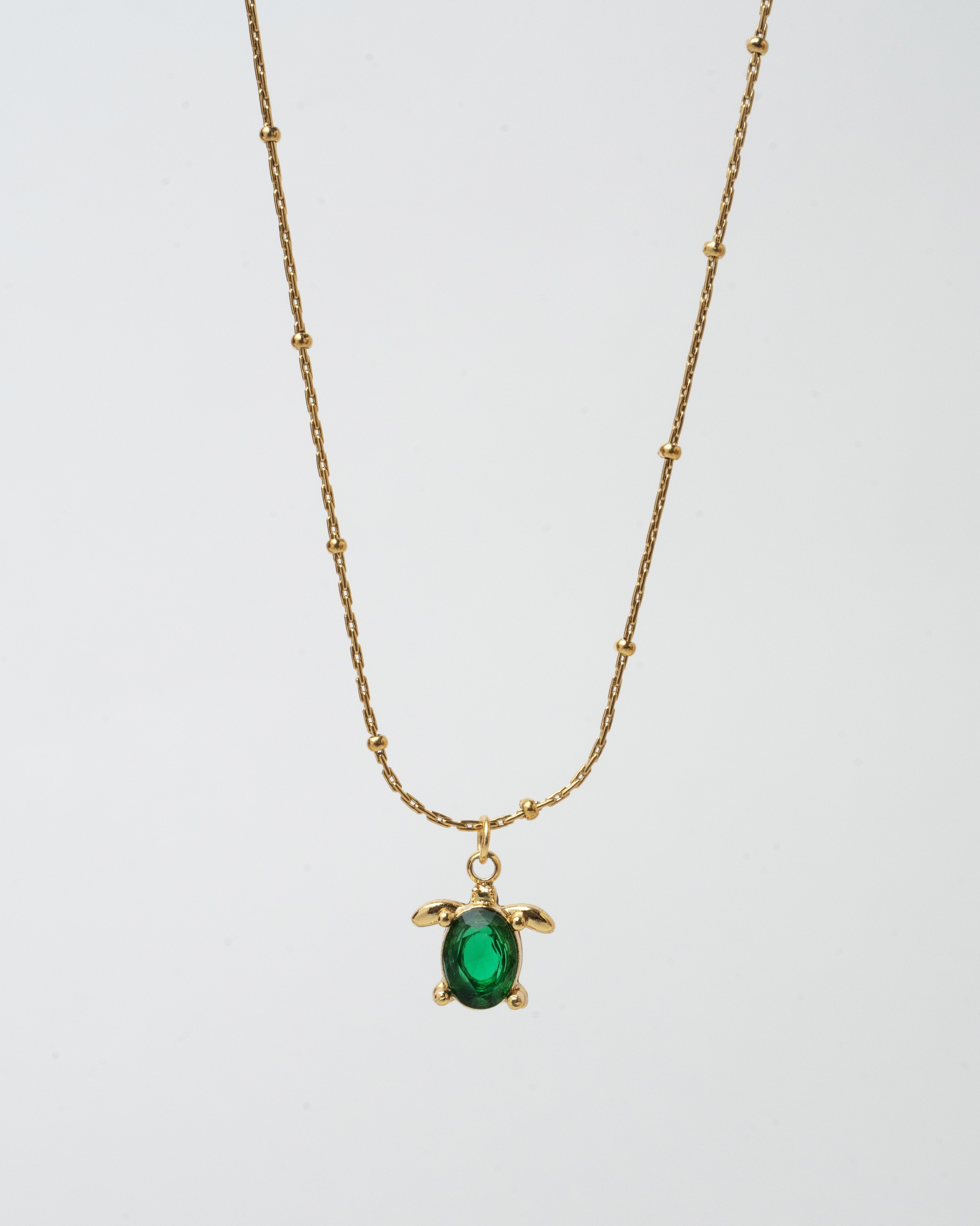 Elegant Gold Turtle Pendant Necklace with Emerald Green Gem