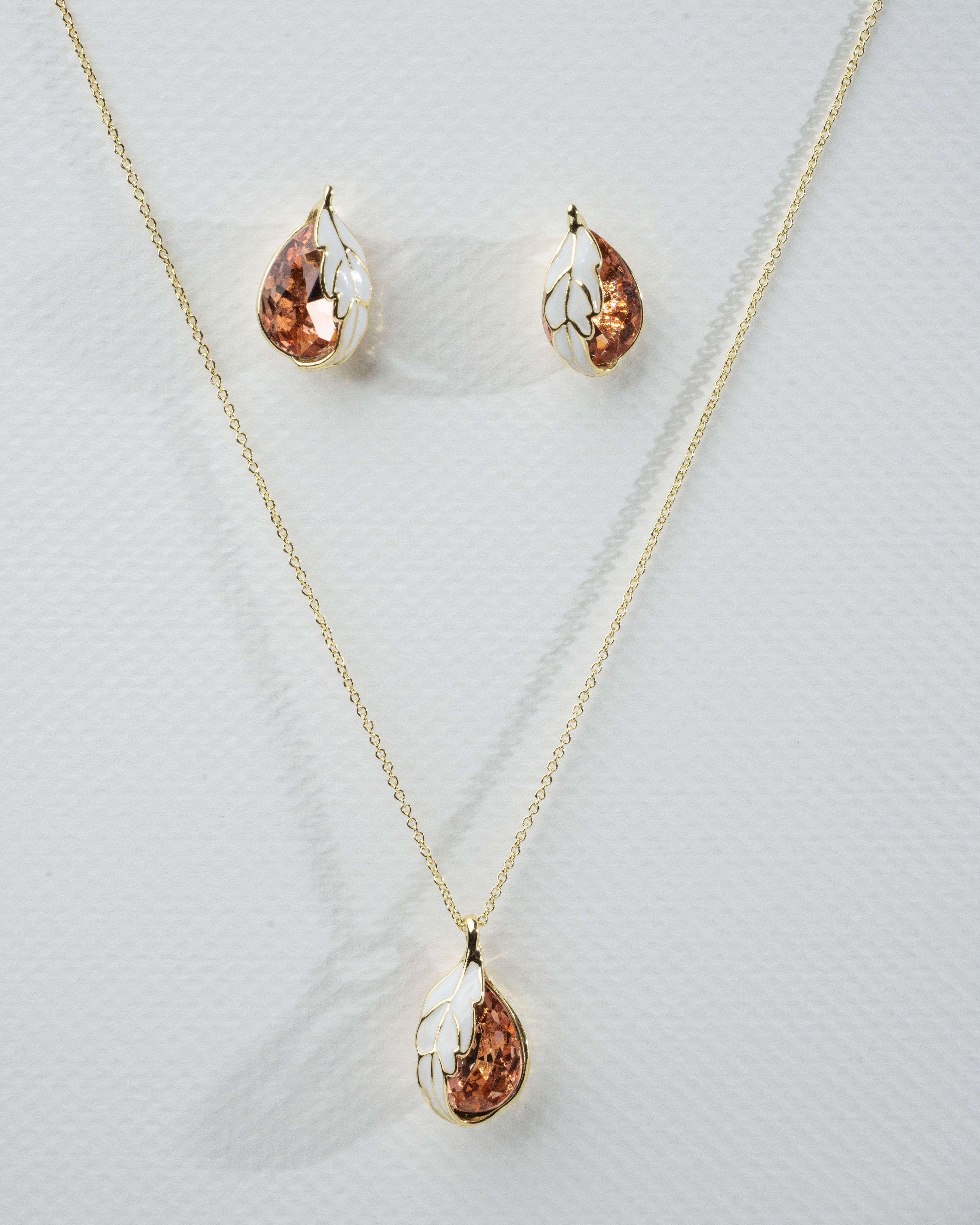 Elegant Gold-Plated Leaf Motif Jwelery Set With Enamel and Crystal Accents