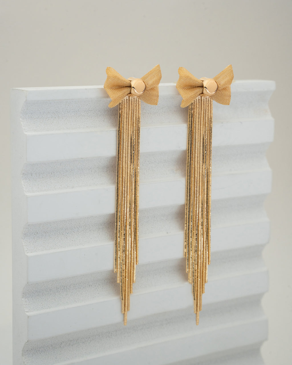Elegant Gold Bow Tassel Earrings