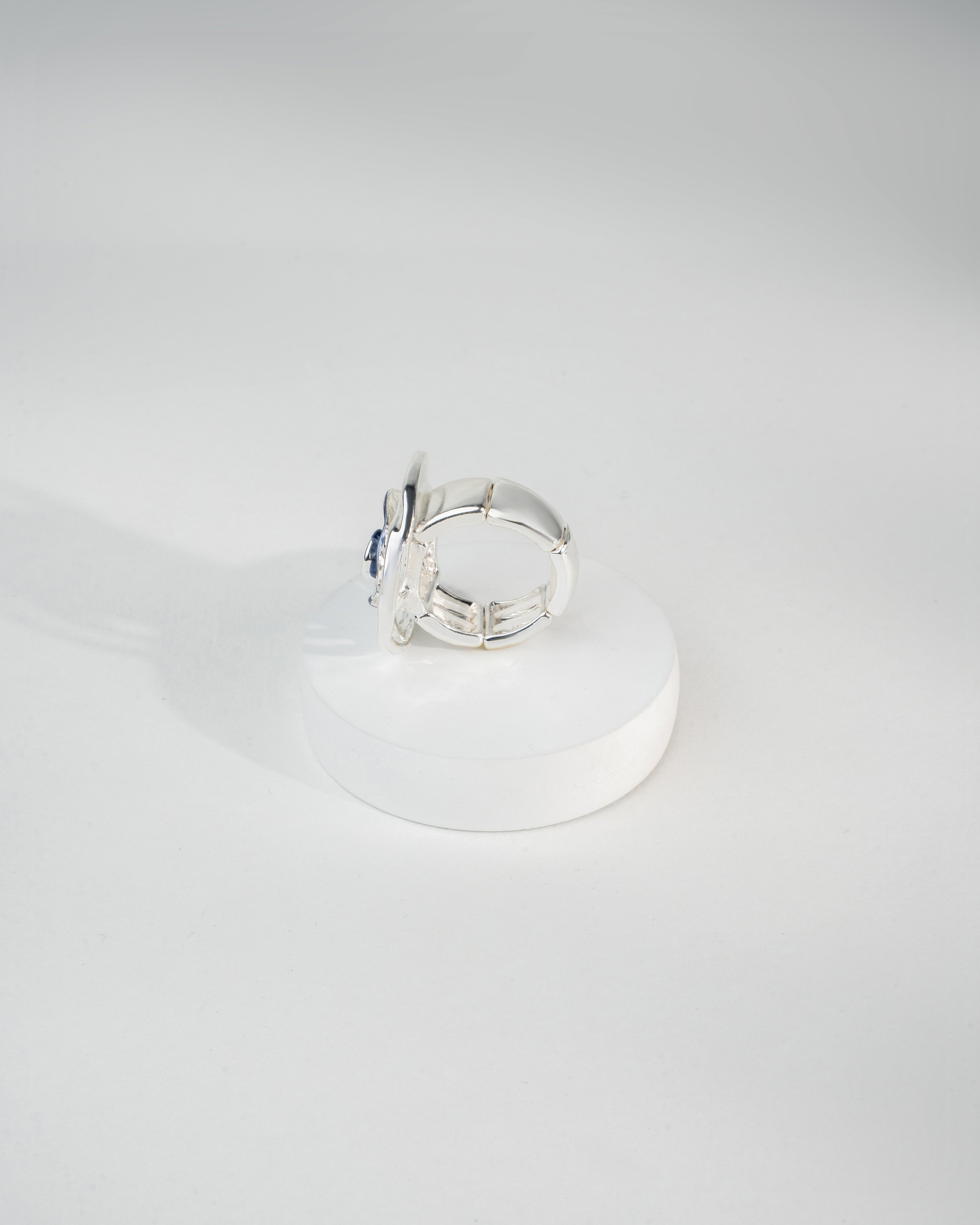 Elegant Silver Swirl Blue Gemstone Ring