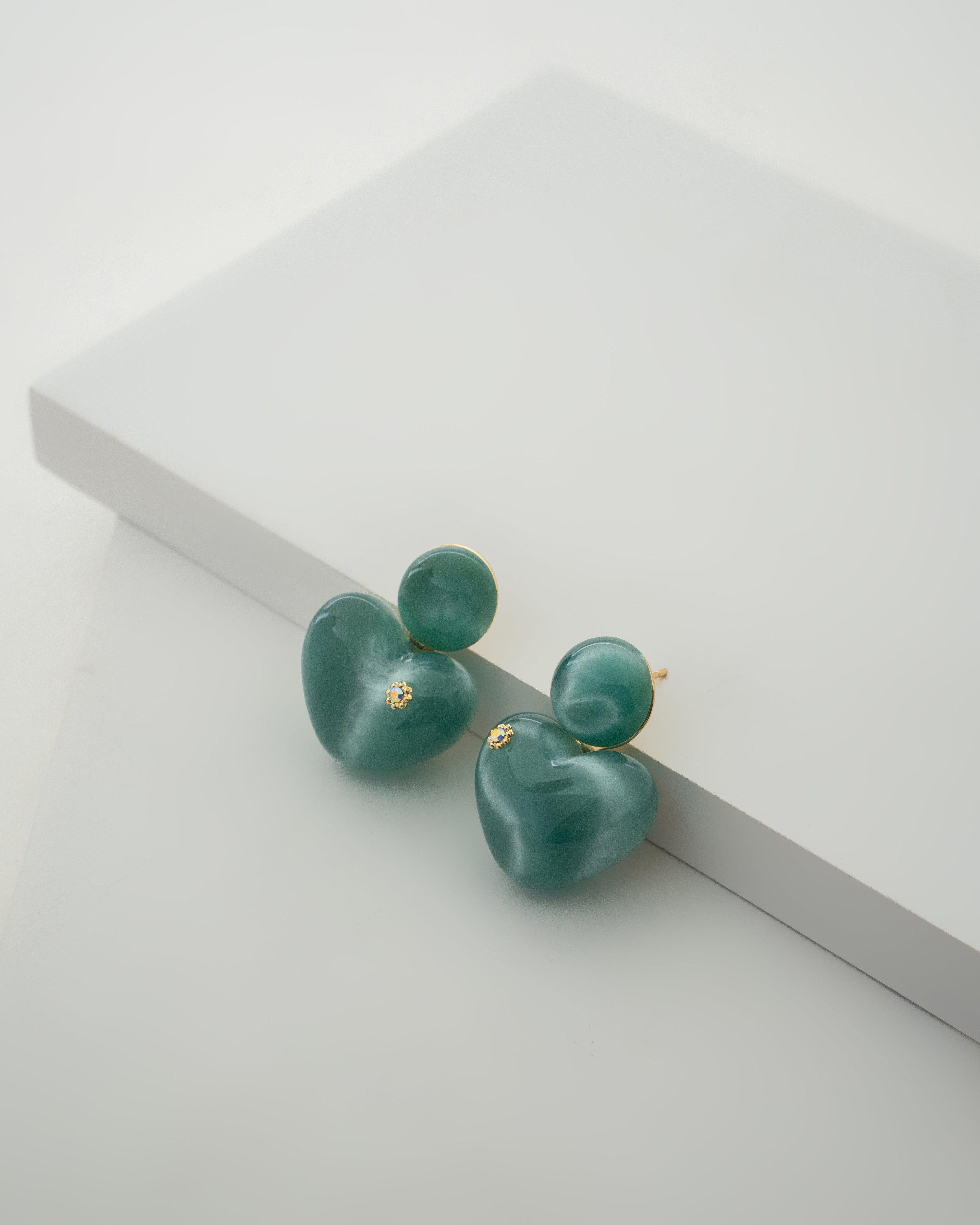 Elegant Teal Heart Shaped Stud Earrings with Gold Accents