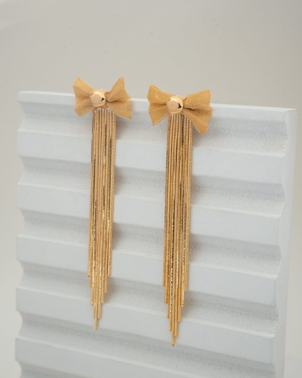 Elegant Gold Bow Tassel Earrings