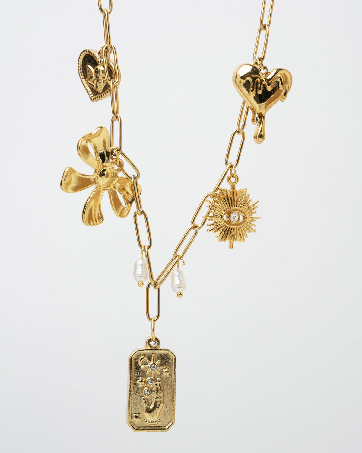 gold charm necklace featuring beautifully crafted pendants