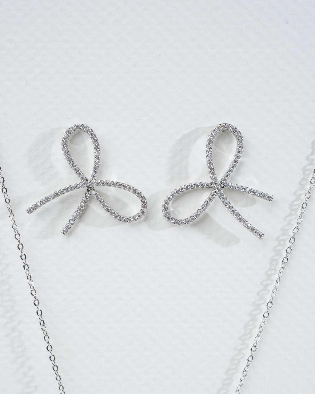 Elegant Silver Bow Necklace and Earring Set