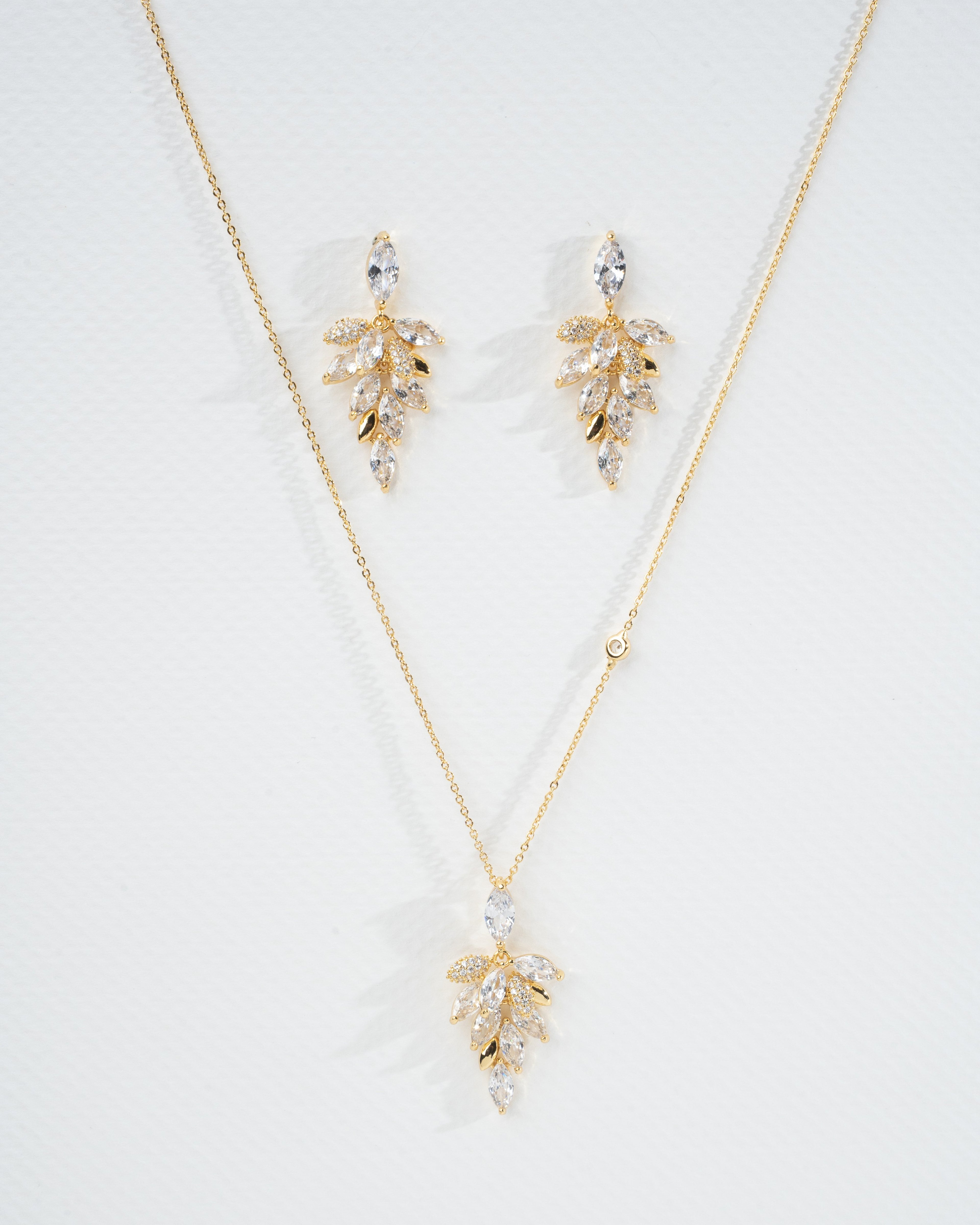 Elegant Gold Leaf Necklace and Earring Set with Crystal Accents