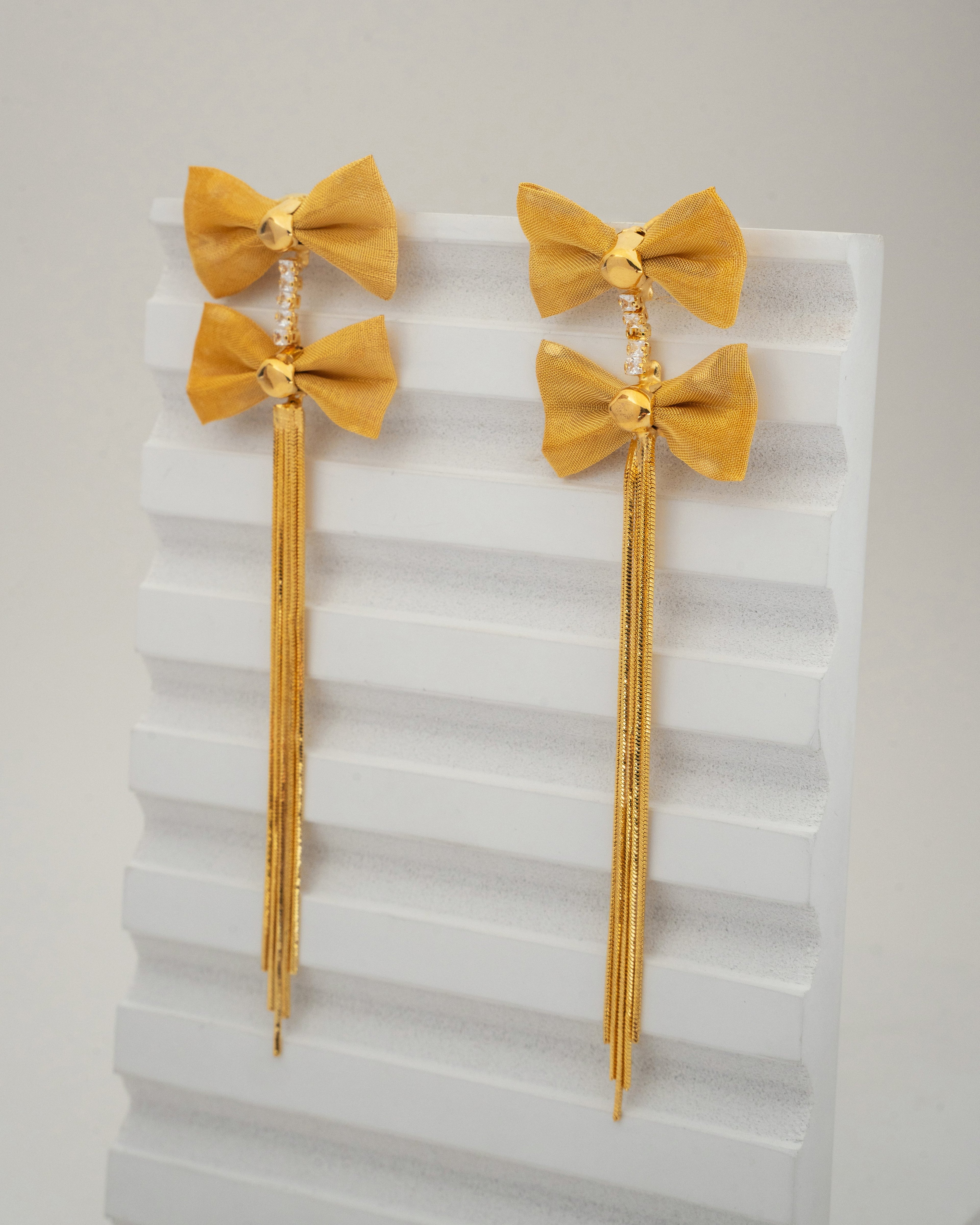 Elegant Gold Bow Tassel Earrings with Crystal Accents