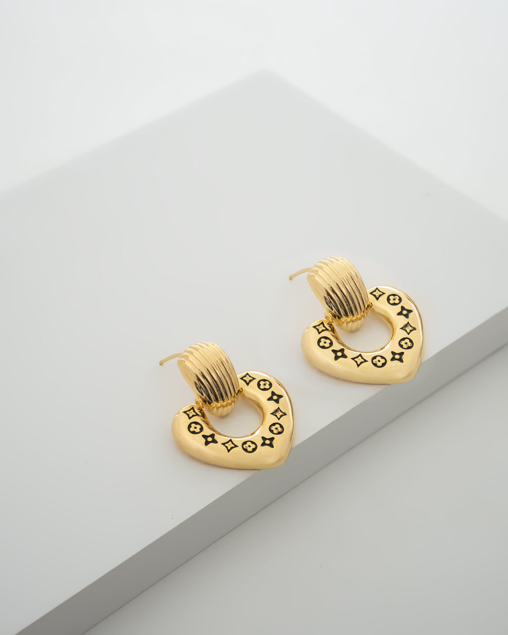 Elegant Gold-Tone Heart-Shaped Dangle Earrings