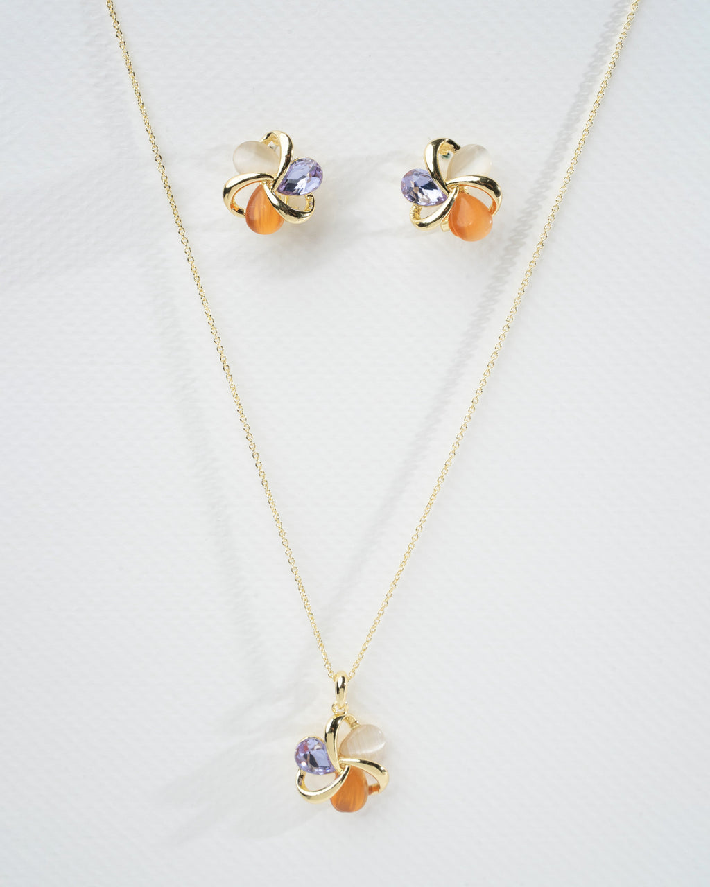 Elegant Multi-Stone Gold Twist Earrings