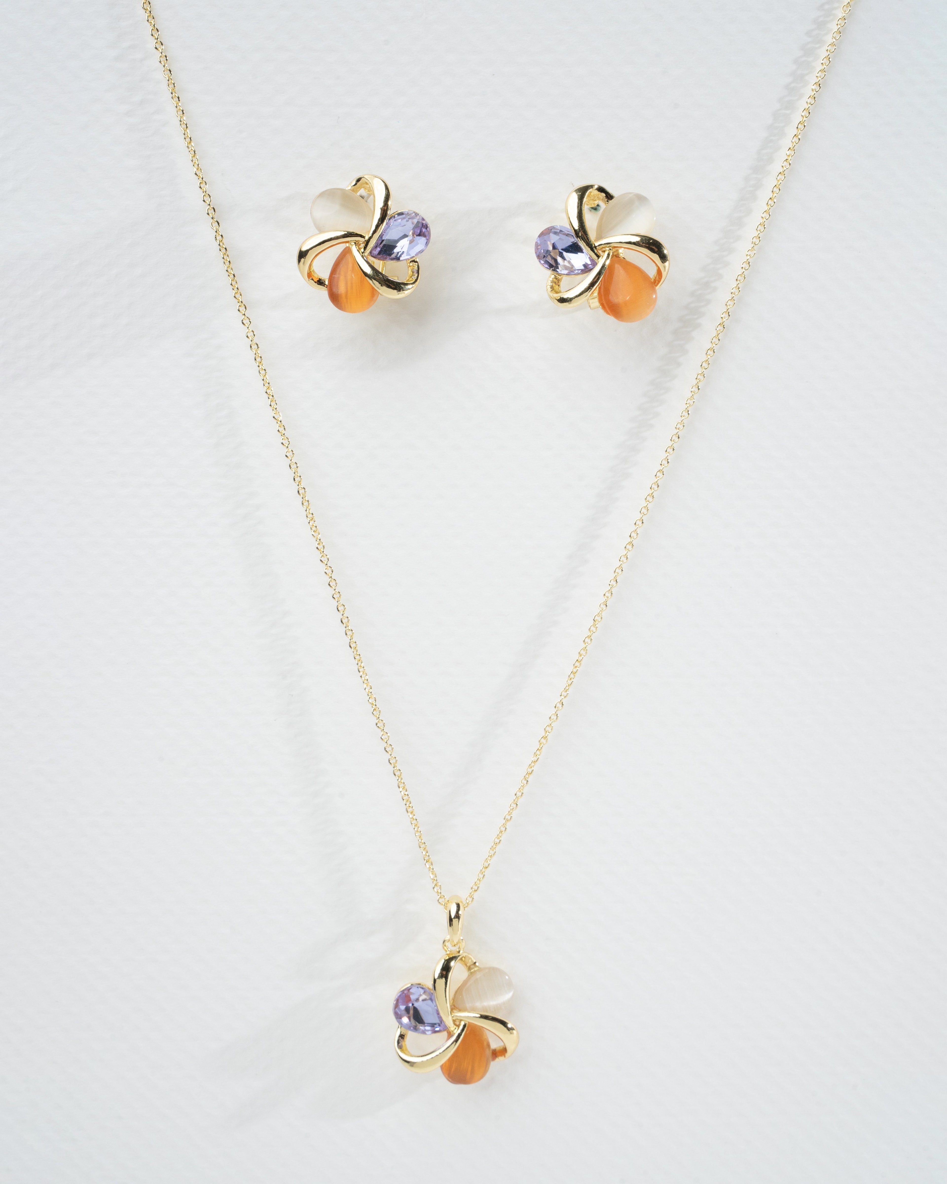 Elegant Multi-Stone Gold Twist Earrings