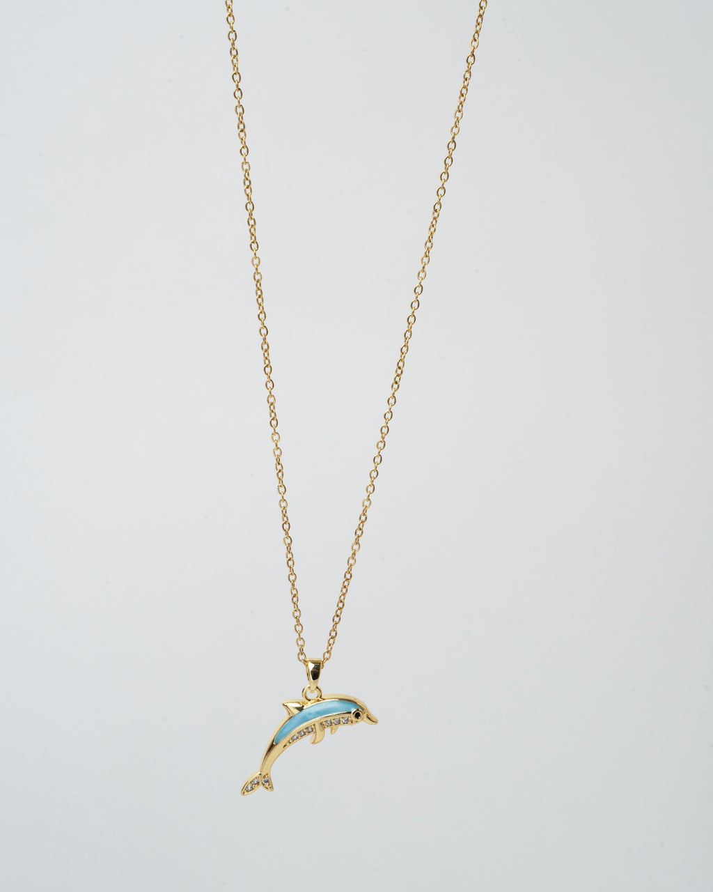 Elegant Gold Dolphin Pendant Necklace with Aquamarine Accents