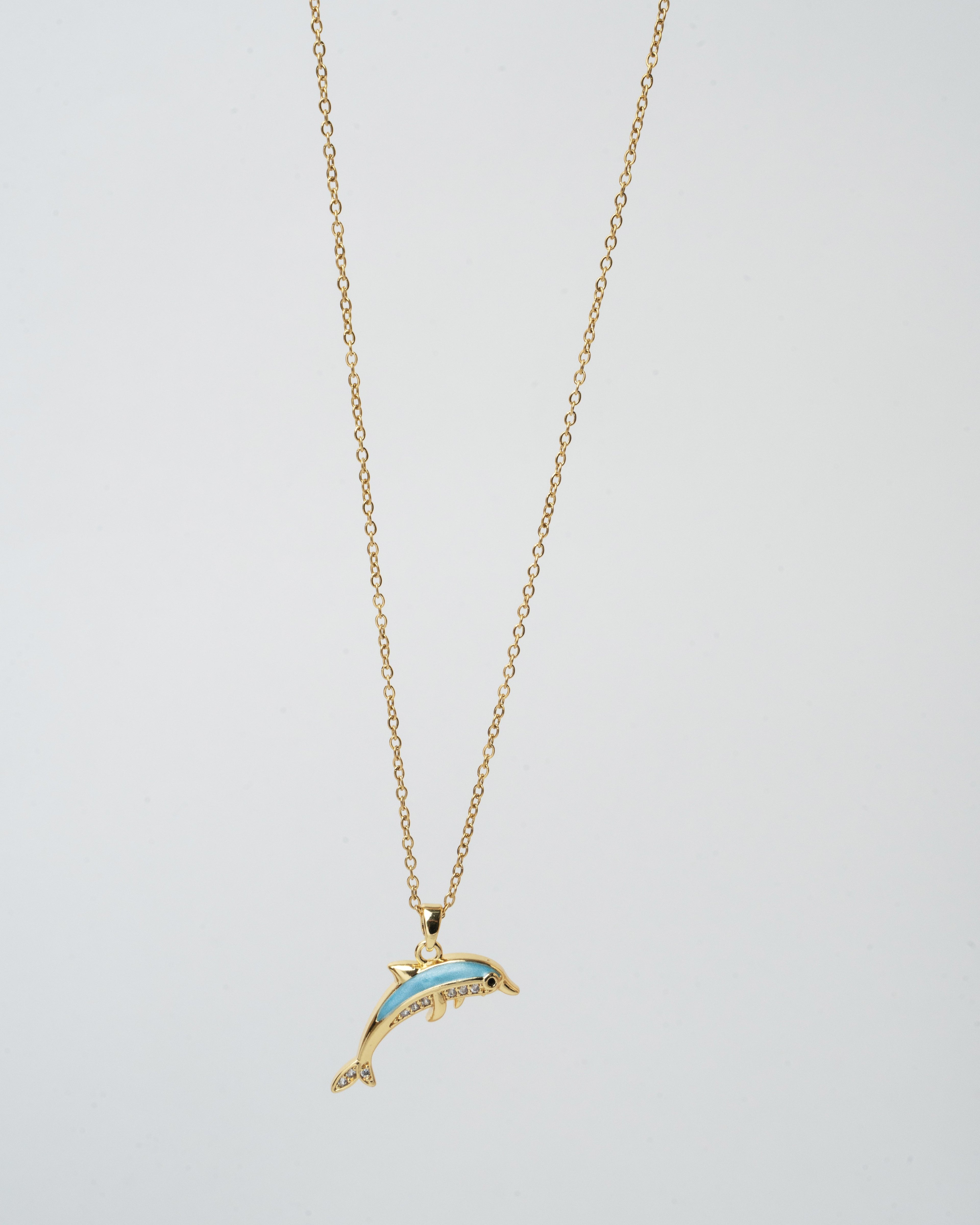 Elegant Gold Dolphin Pendant Necklace with Aquamarine Accents