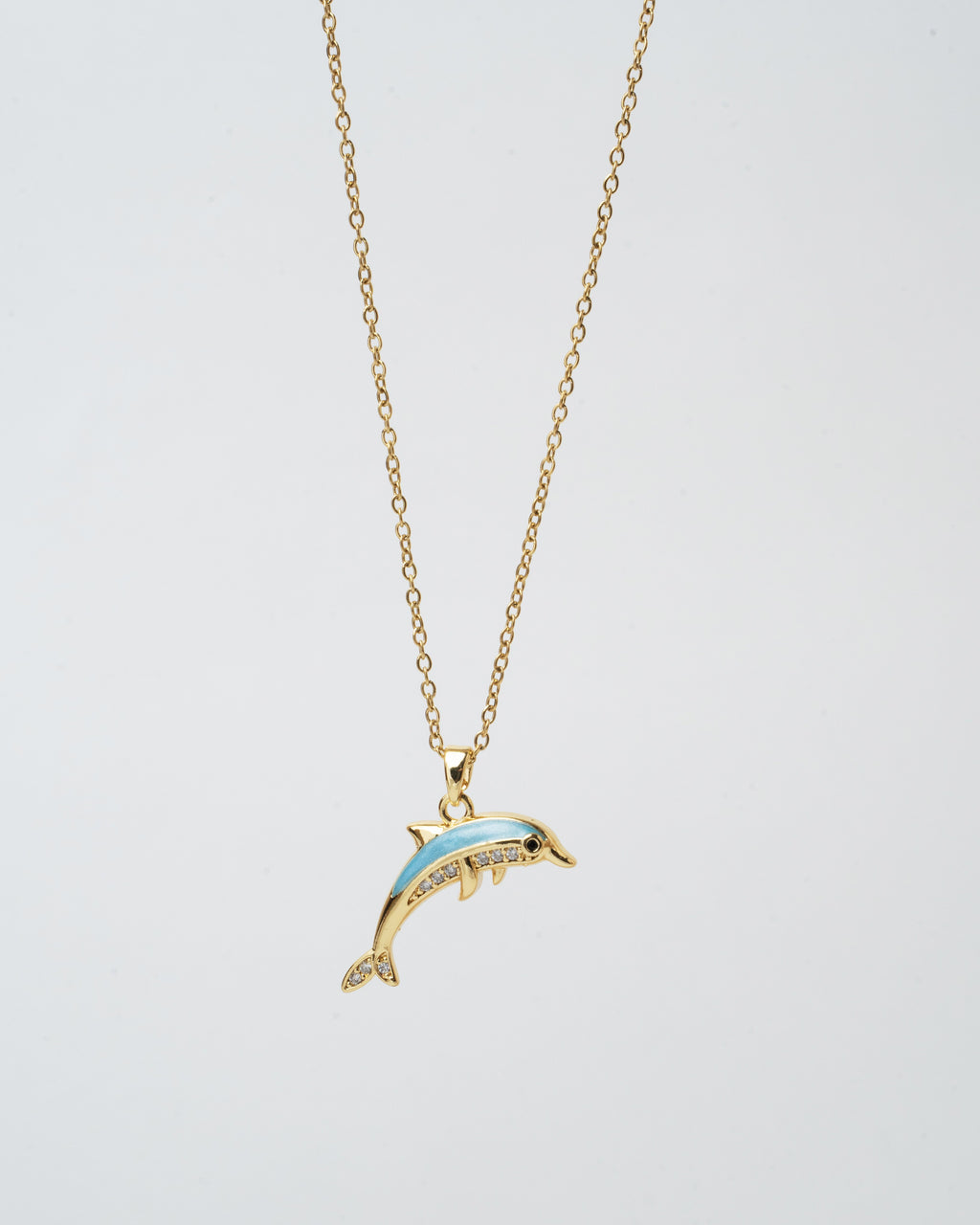Elegant Gold Dolphin Pendant Necklace with Aquamarine Accents