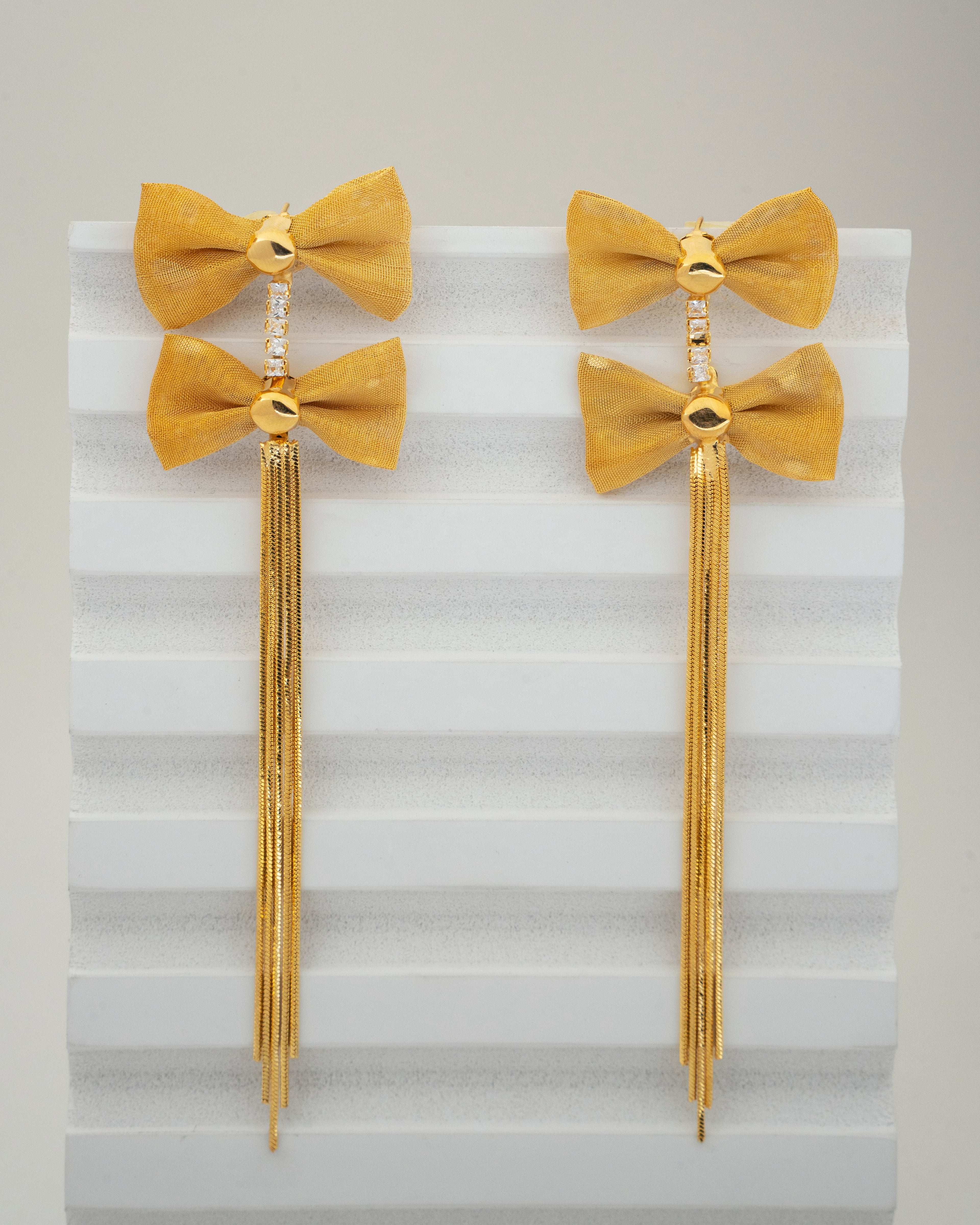 Elegant Gold Bow Tassel Earrings with Crystal Accents