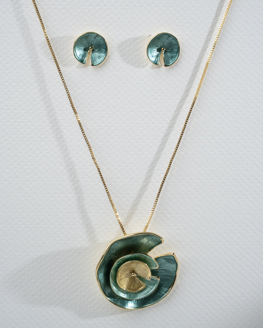 Elegant Gold and Teal Spiral Jewelry Set