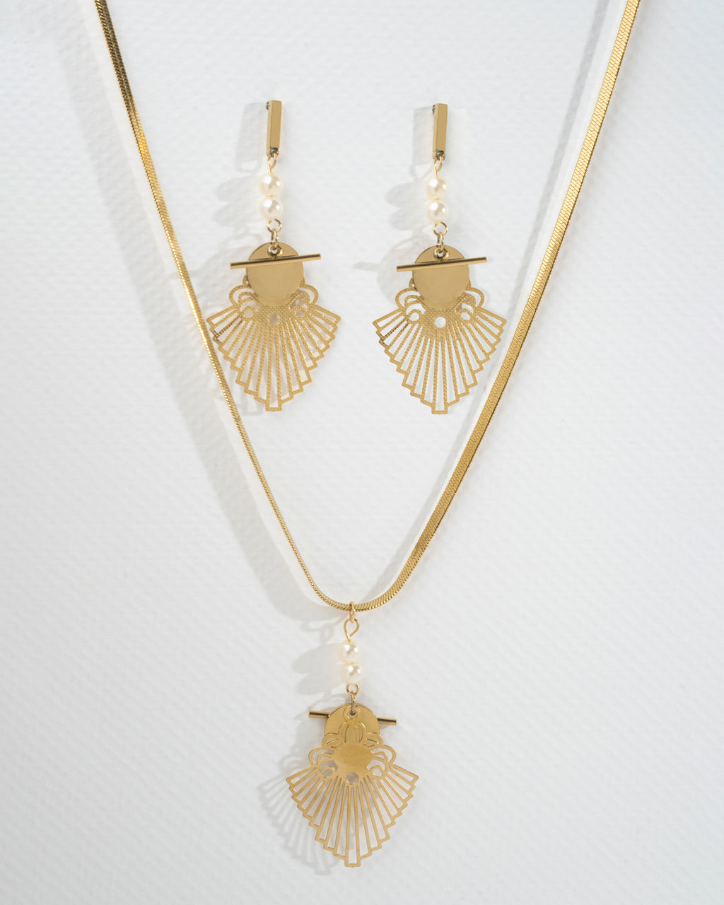 Elegant Gold Filigree Pendant and Earring Set with Pearl Accents