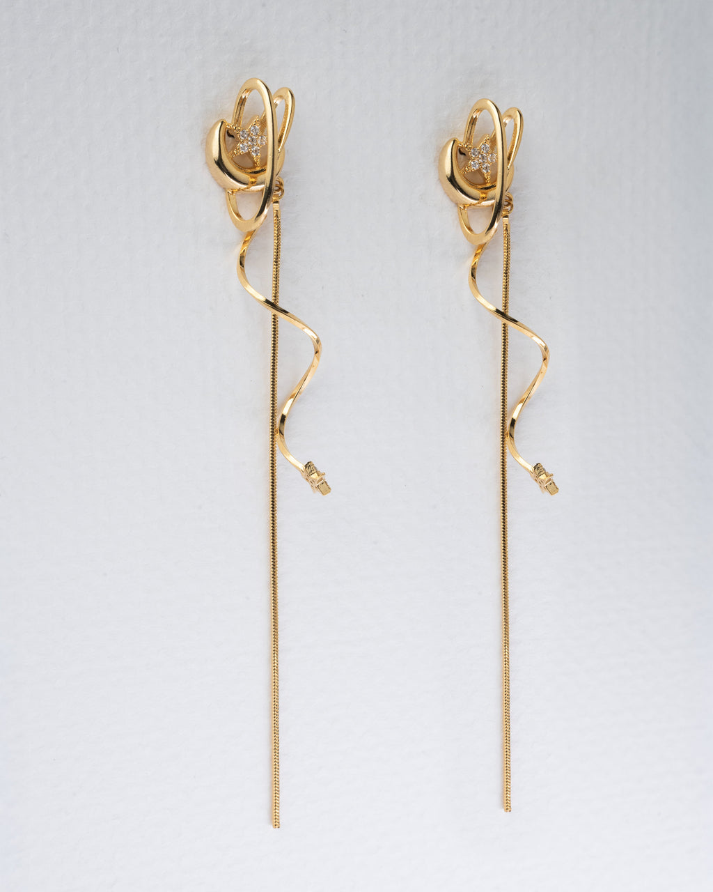 Elegance in Motion: Gold Twisted Drop Earrings