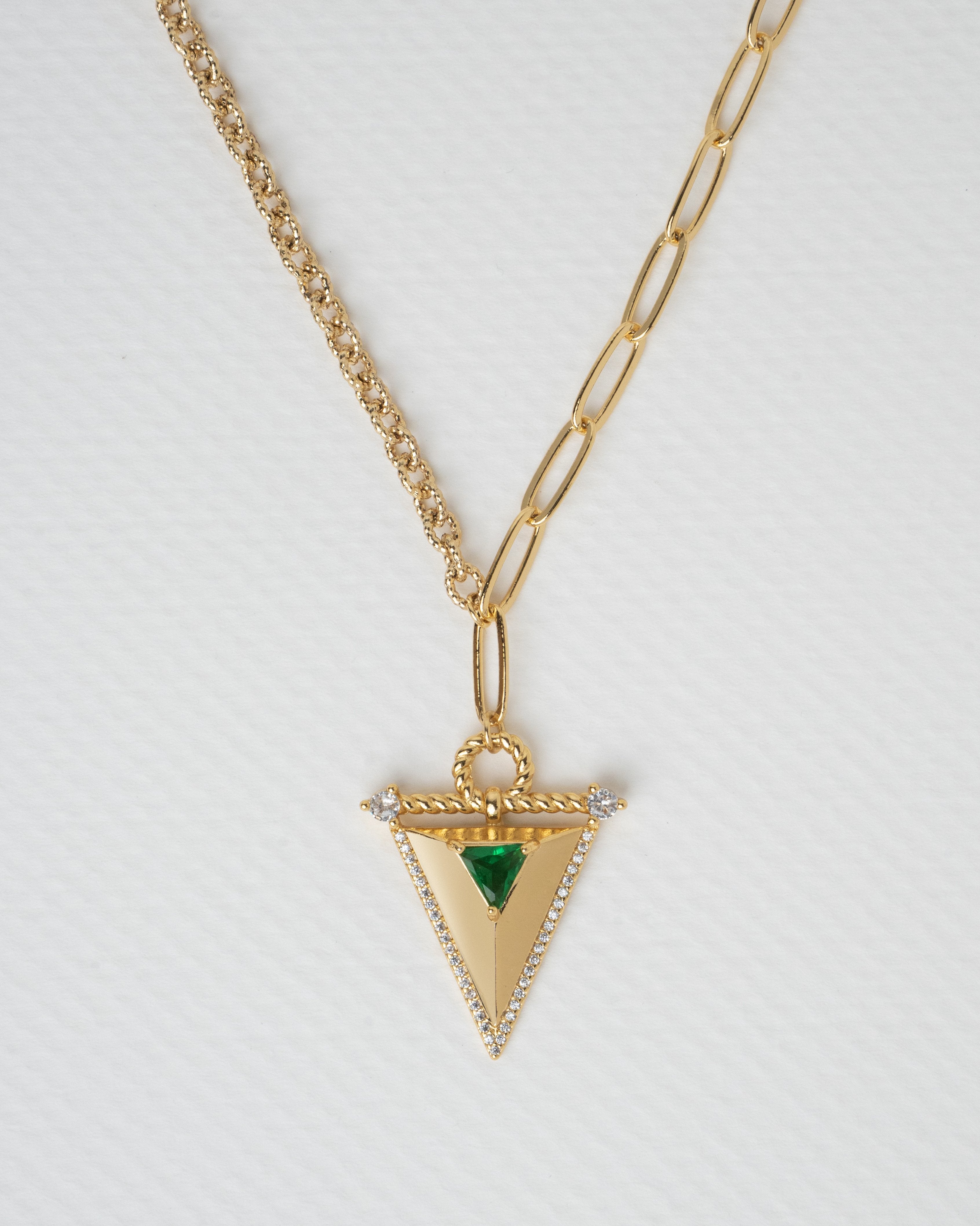Elegant Triangular Gold Jewelry Set with Emerald Highlights