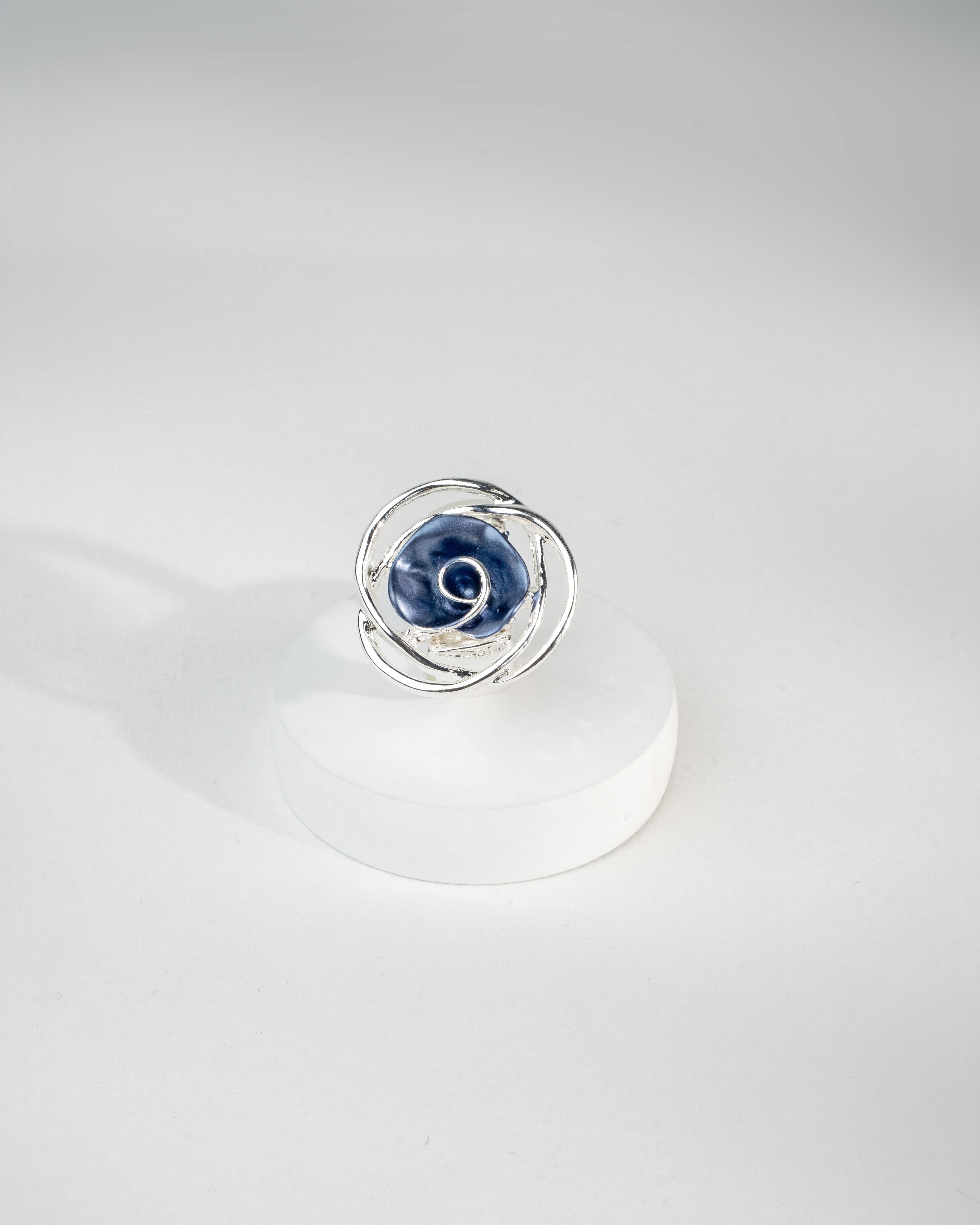 Elegant Silver Swirl Blue Gemstone Ring