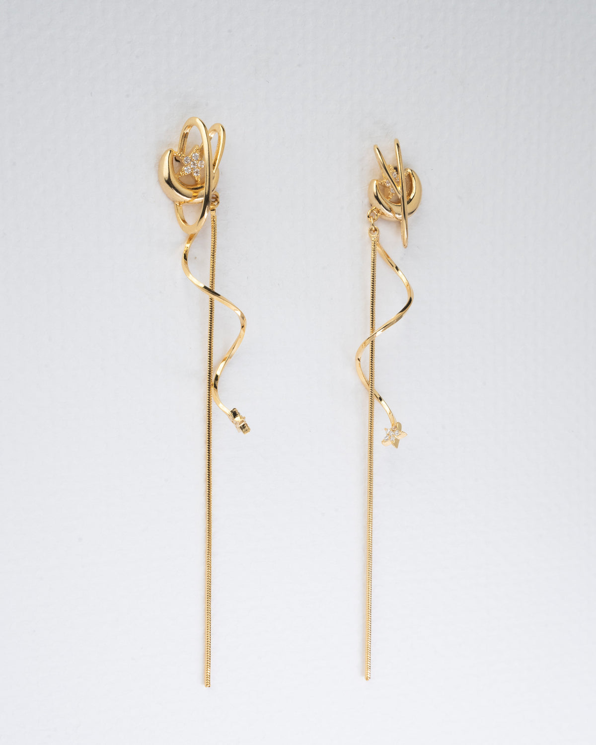 Elegance in Motion: Gold Twisted Drop Earrings