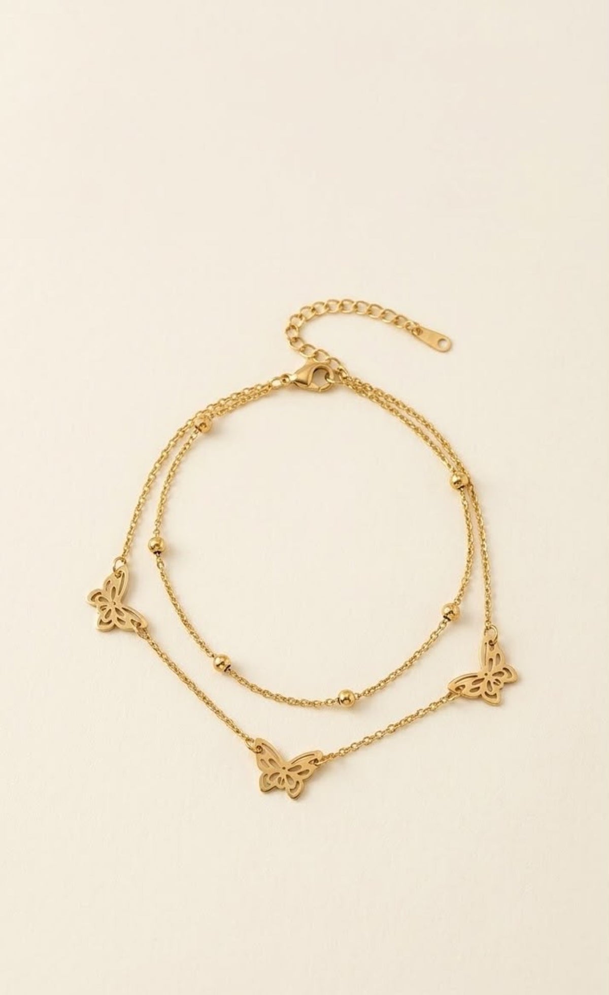 Gold-tone two-layer anklet with filigree butterfly charms - view 2