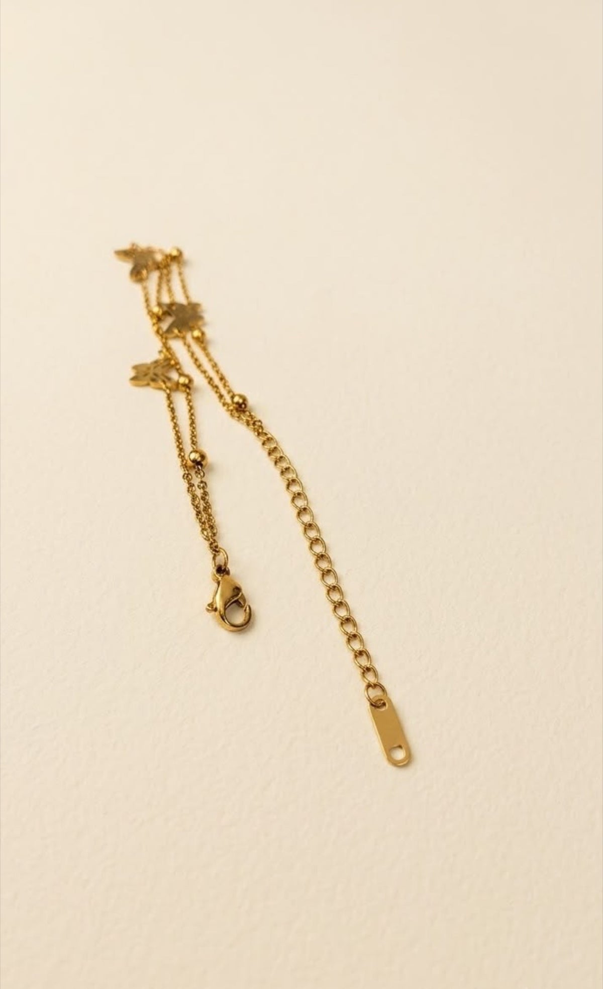 Gold-tone two-layer anklet with filigree butterfly charms - view 3